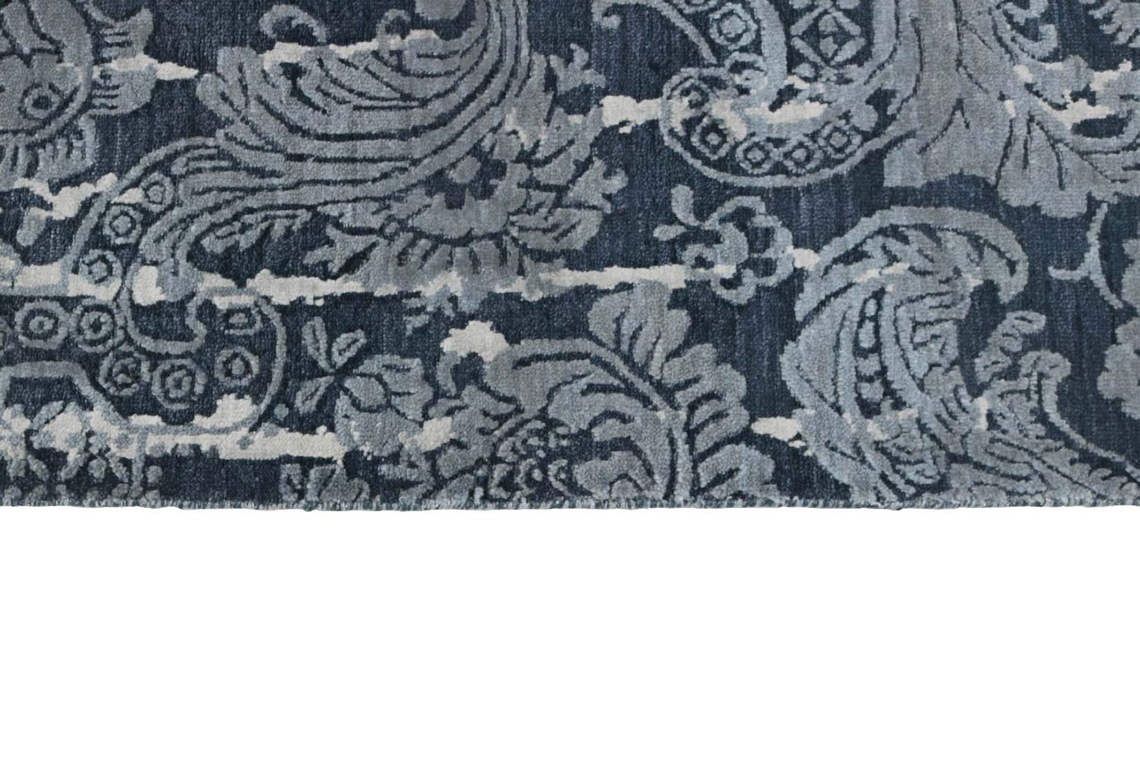 Authentic oriental rug with a damask pattern in blue and grey