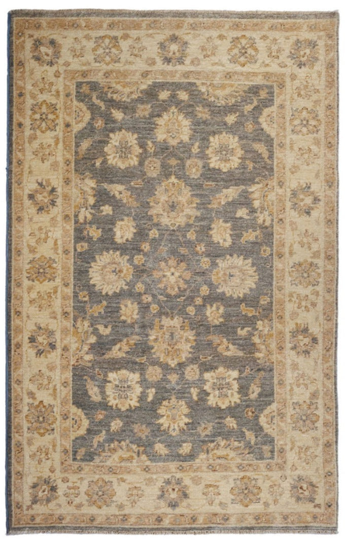 authentic oriental rug with delicate floral pattern in charcoal and beige