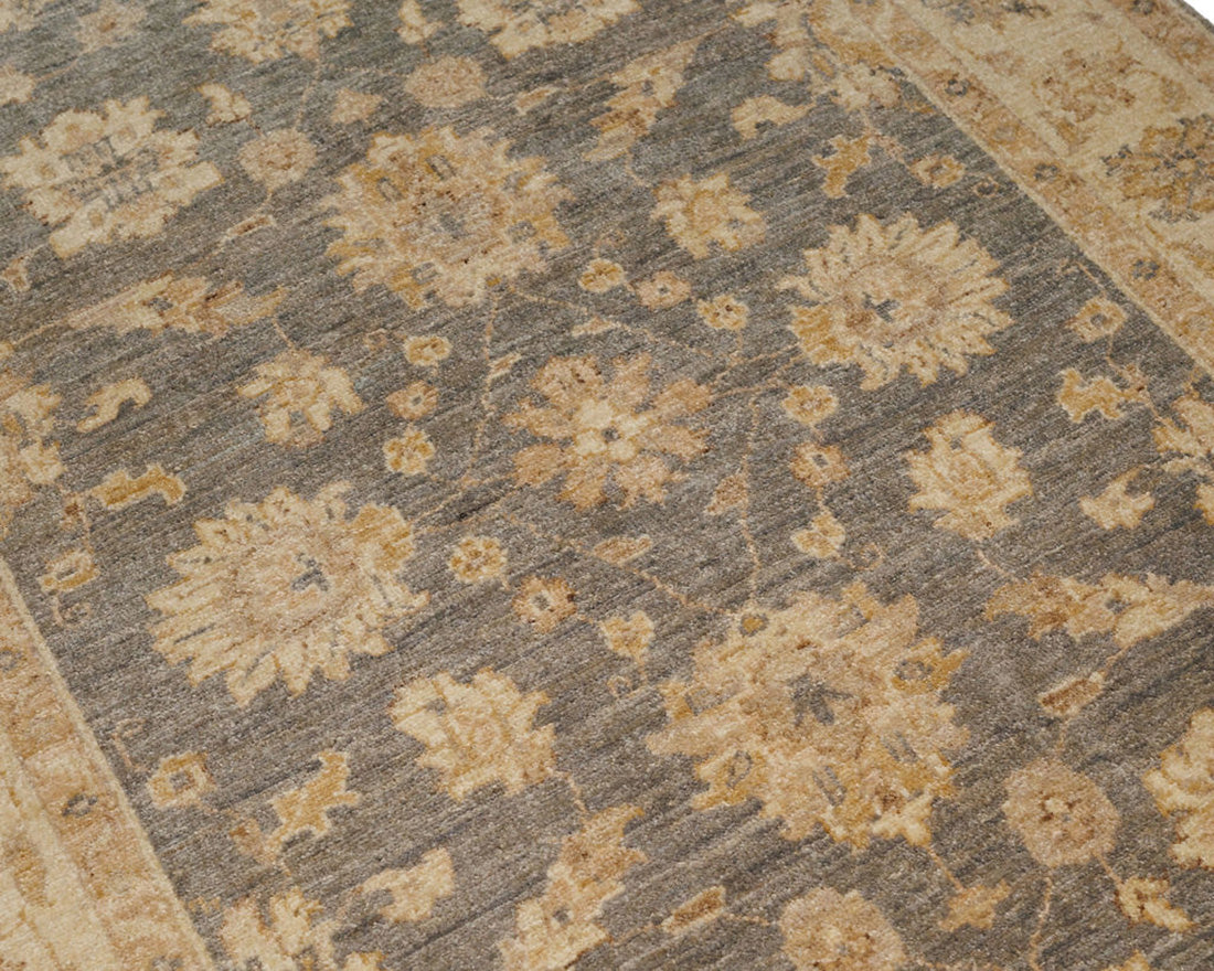 authentic oriental rug with delicate floral pattern in charcoal and beige