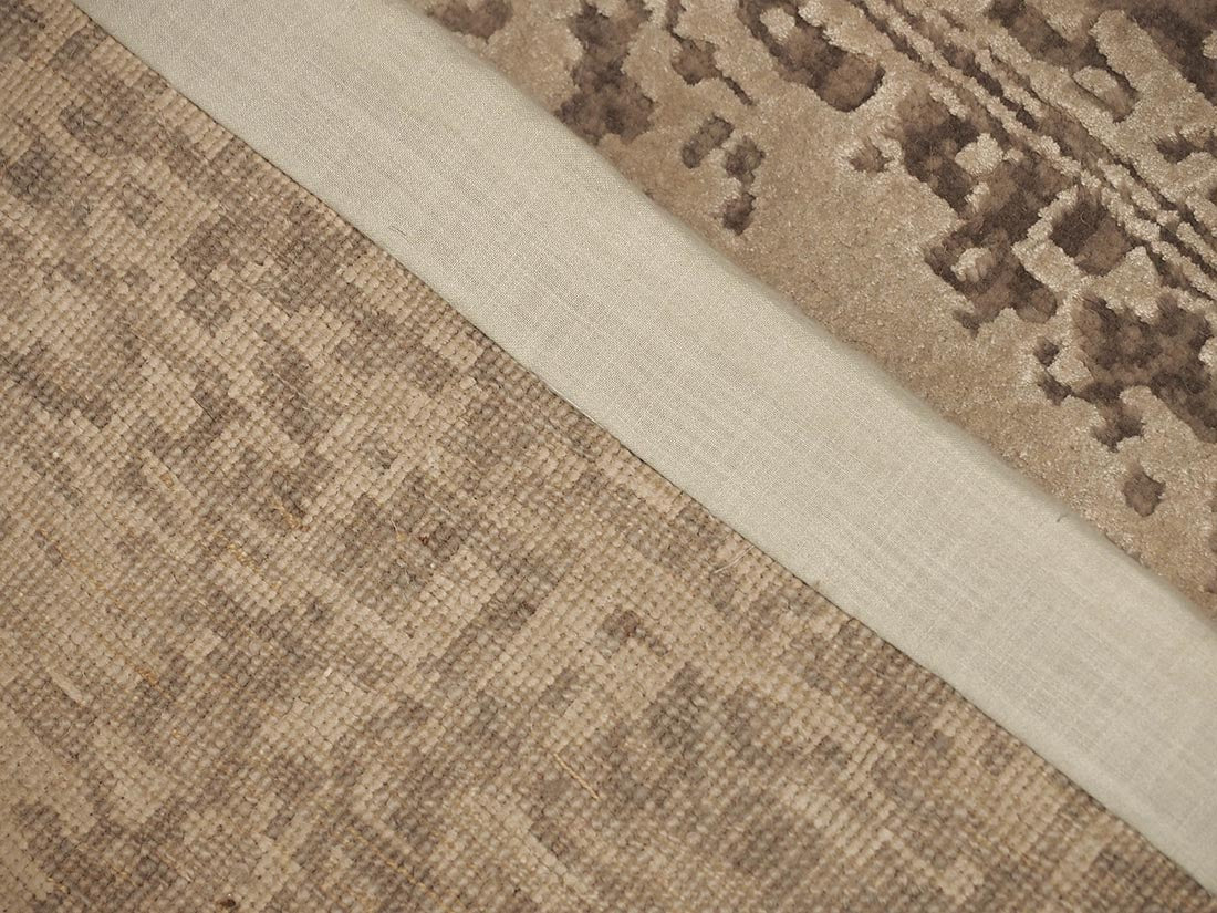 beige abstract area rug