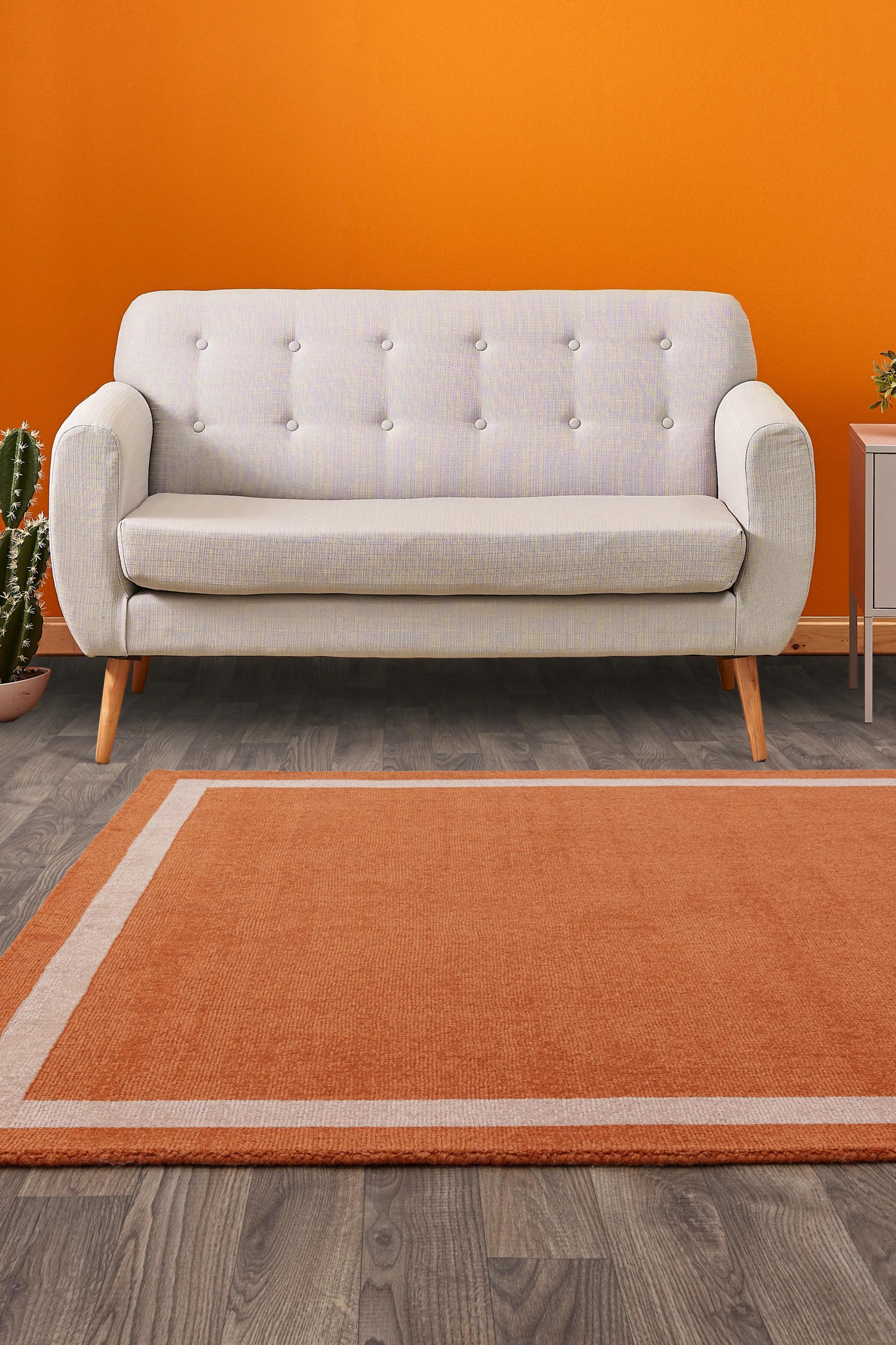 Modern orange border style rug