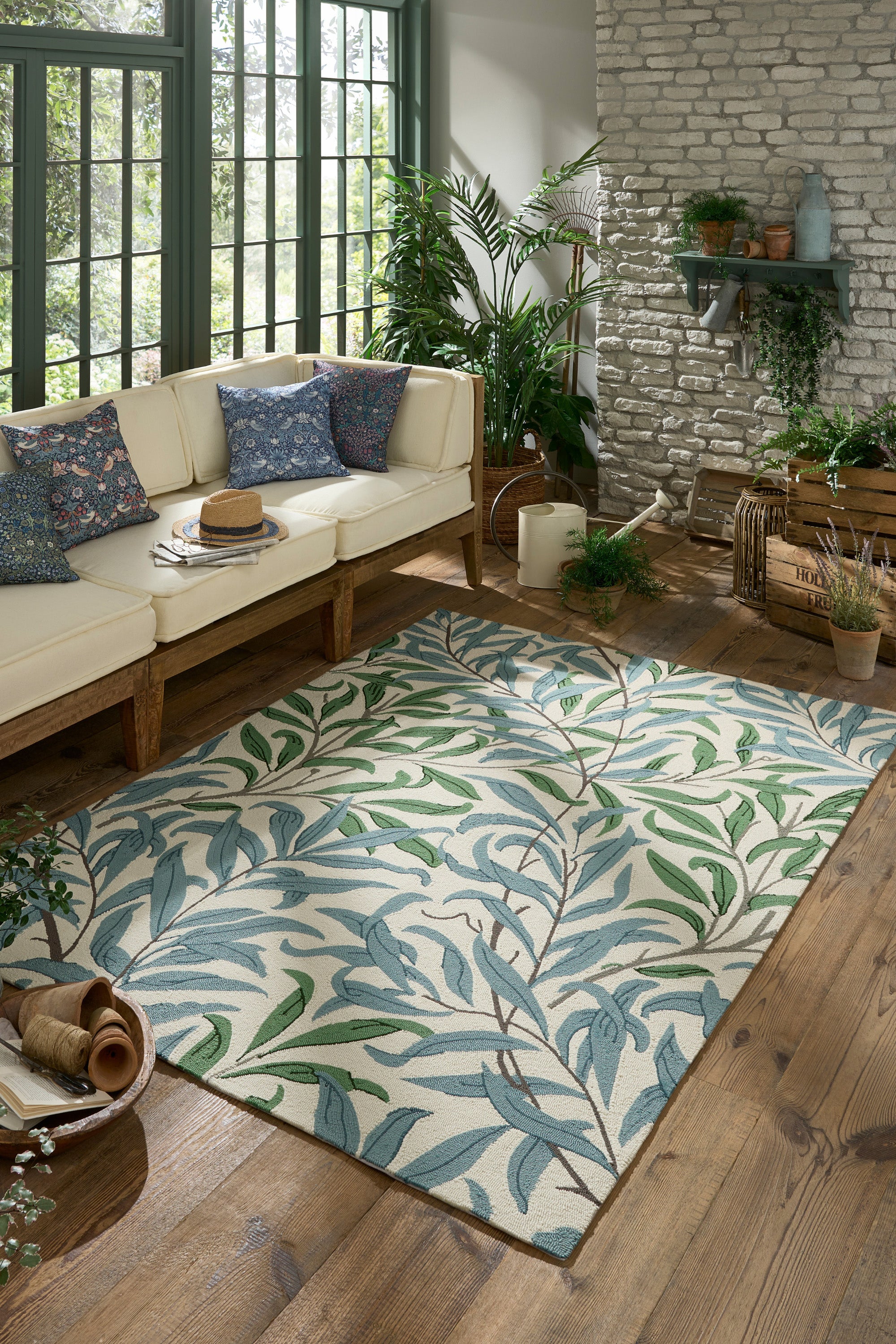 blue indoor/outdoor rug with floral pattern