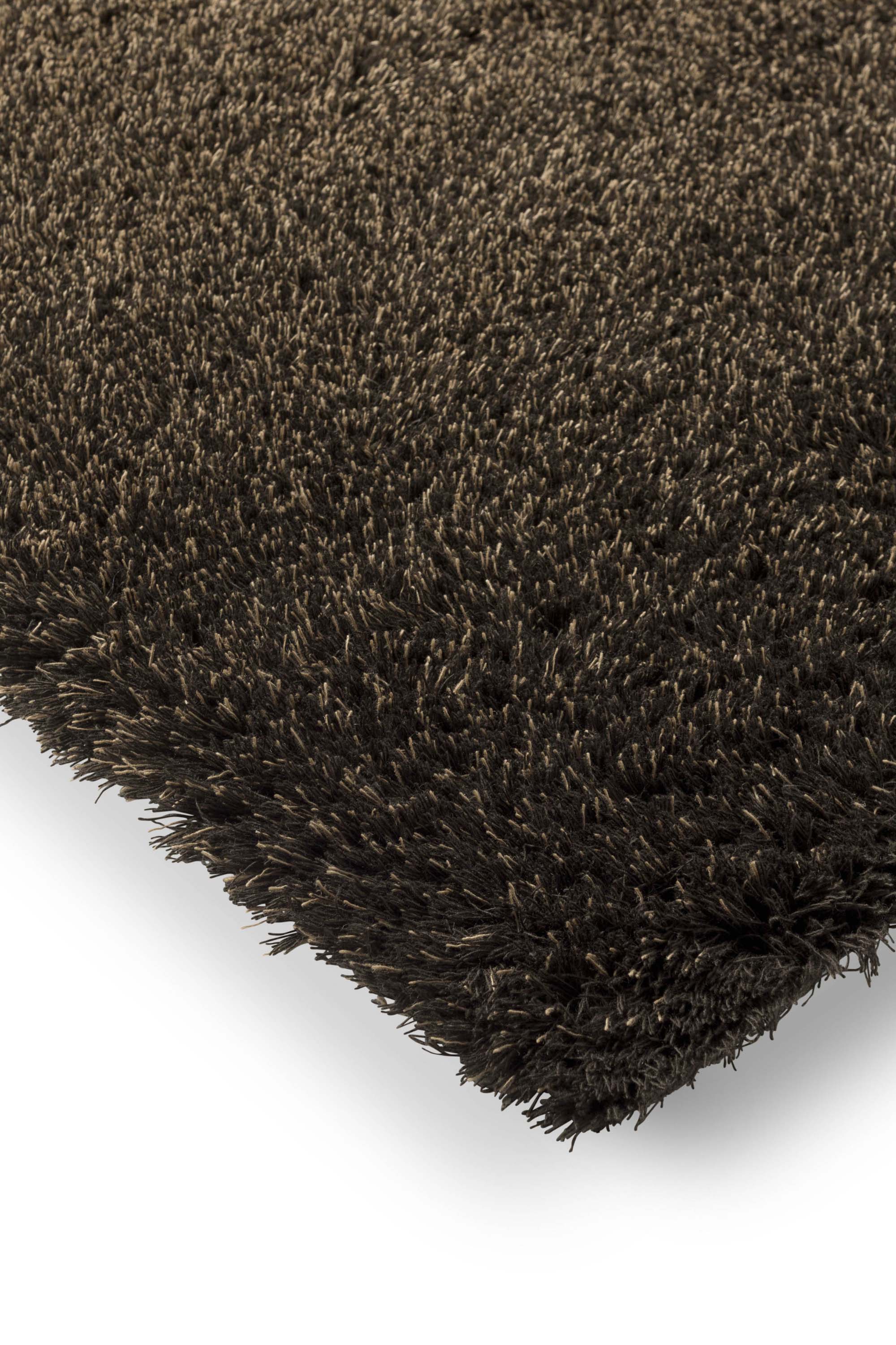 Plain brown rug with shaggy pile