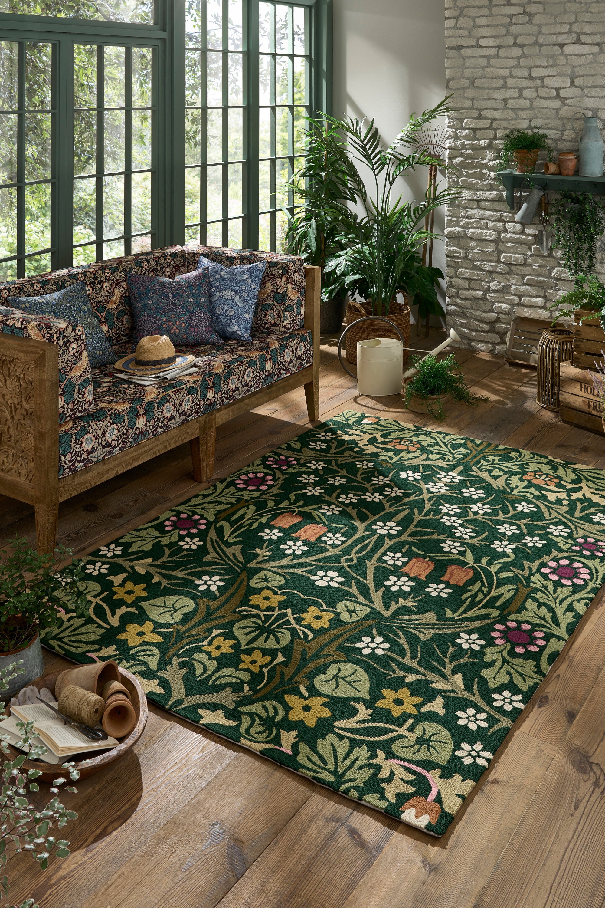 green indoor/outdoor rug with floral pattern