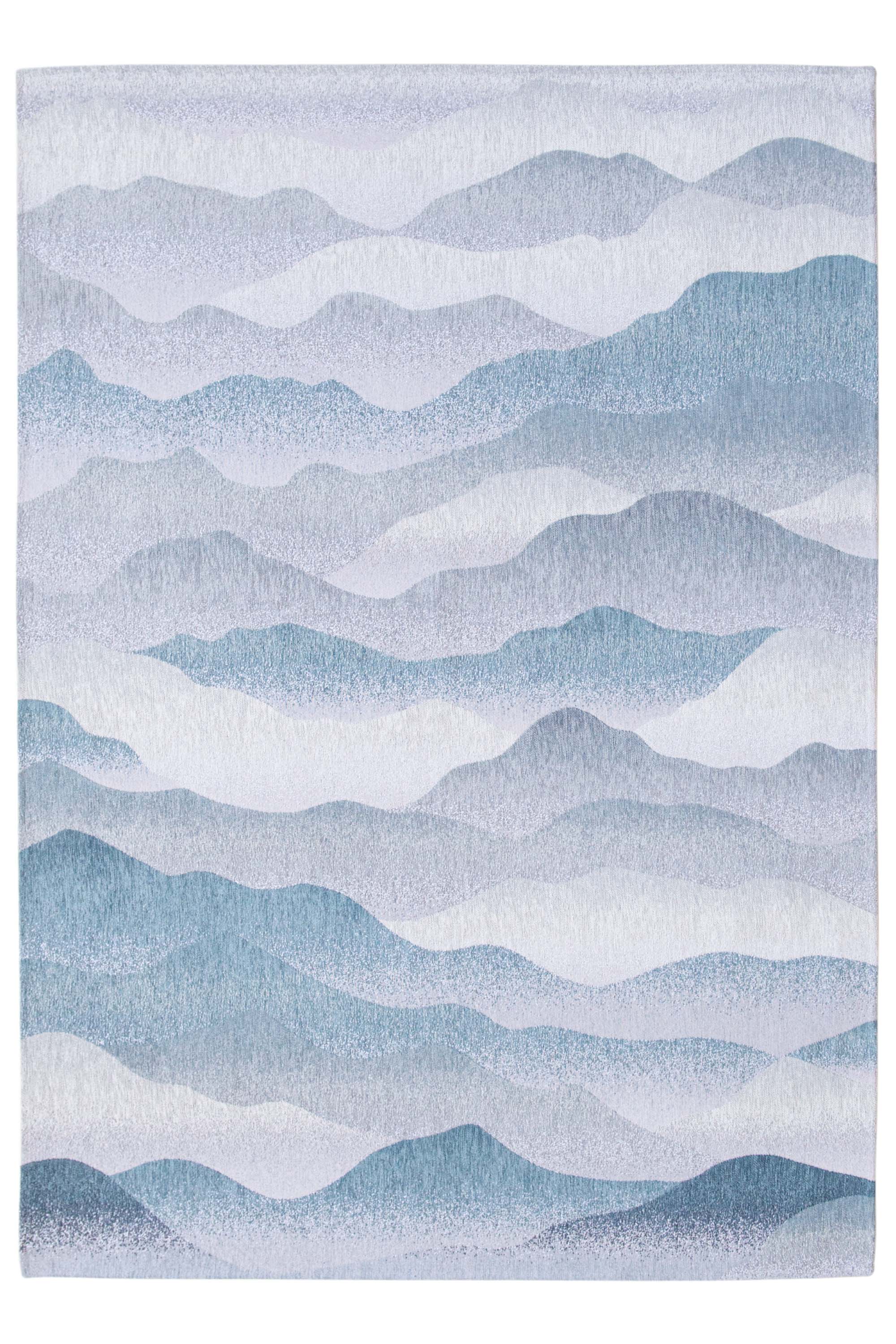 Modern rug with blue abstract mountain range pattern