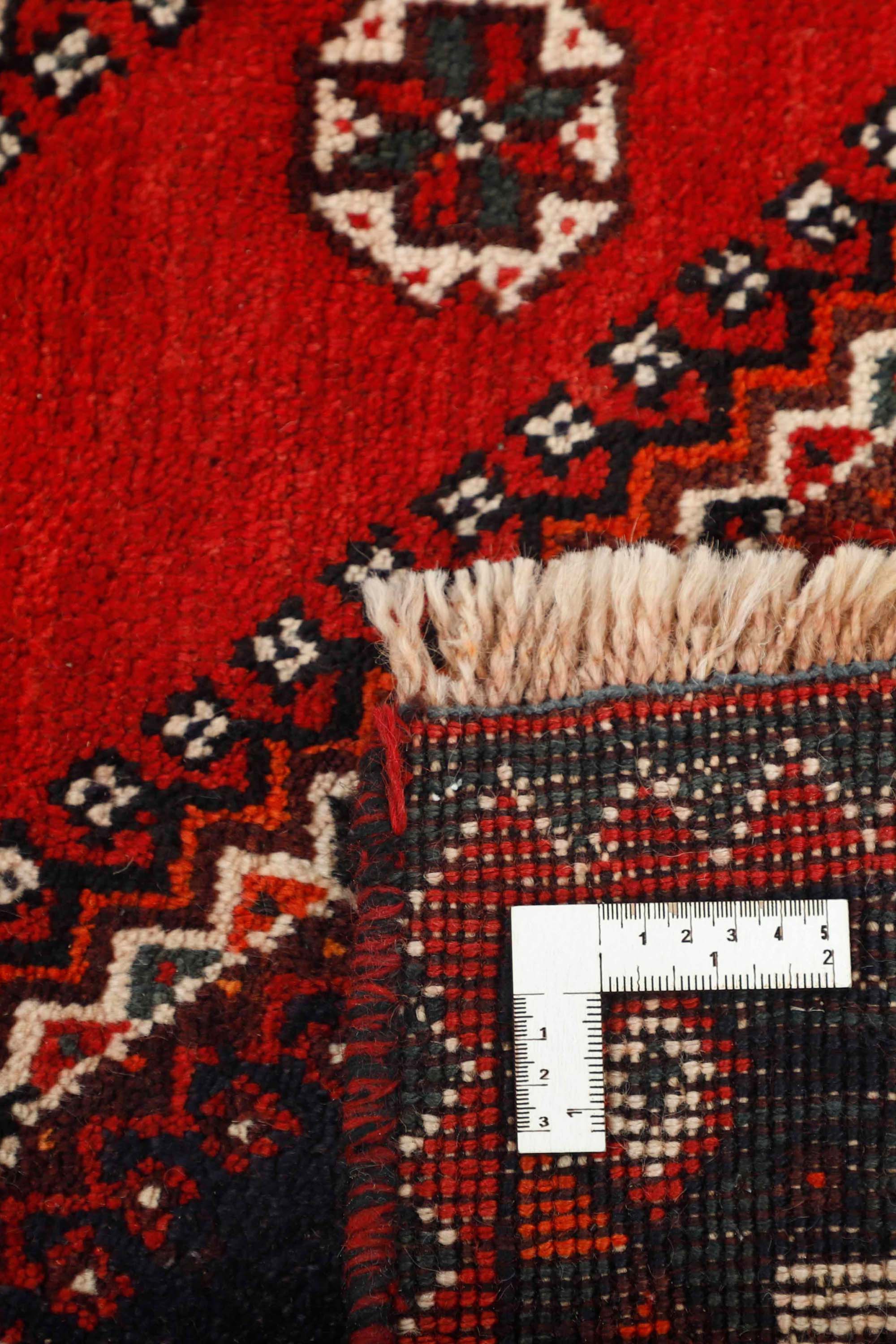 Traditional bordered Shiraz rug