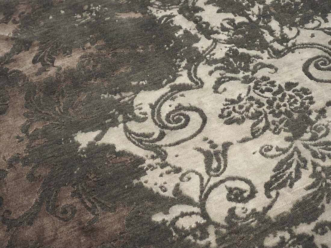 Authentic oriental rug with a damask pattern in beige and brown