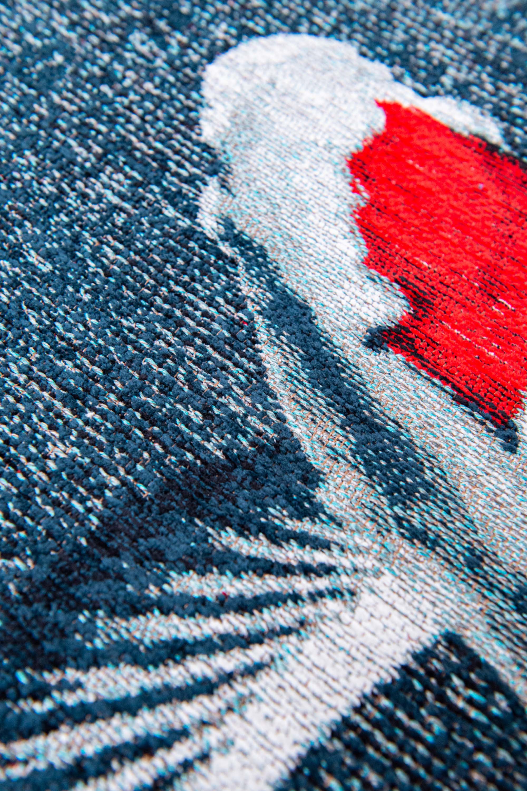 Modern navy rug with detailed koi fish print