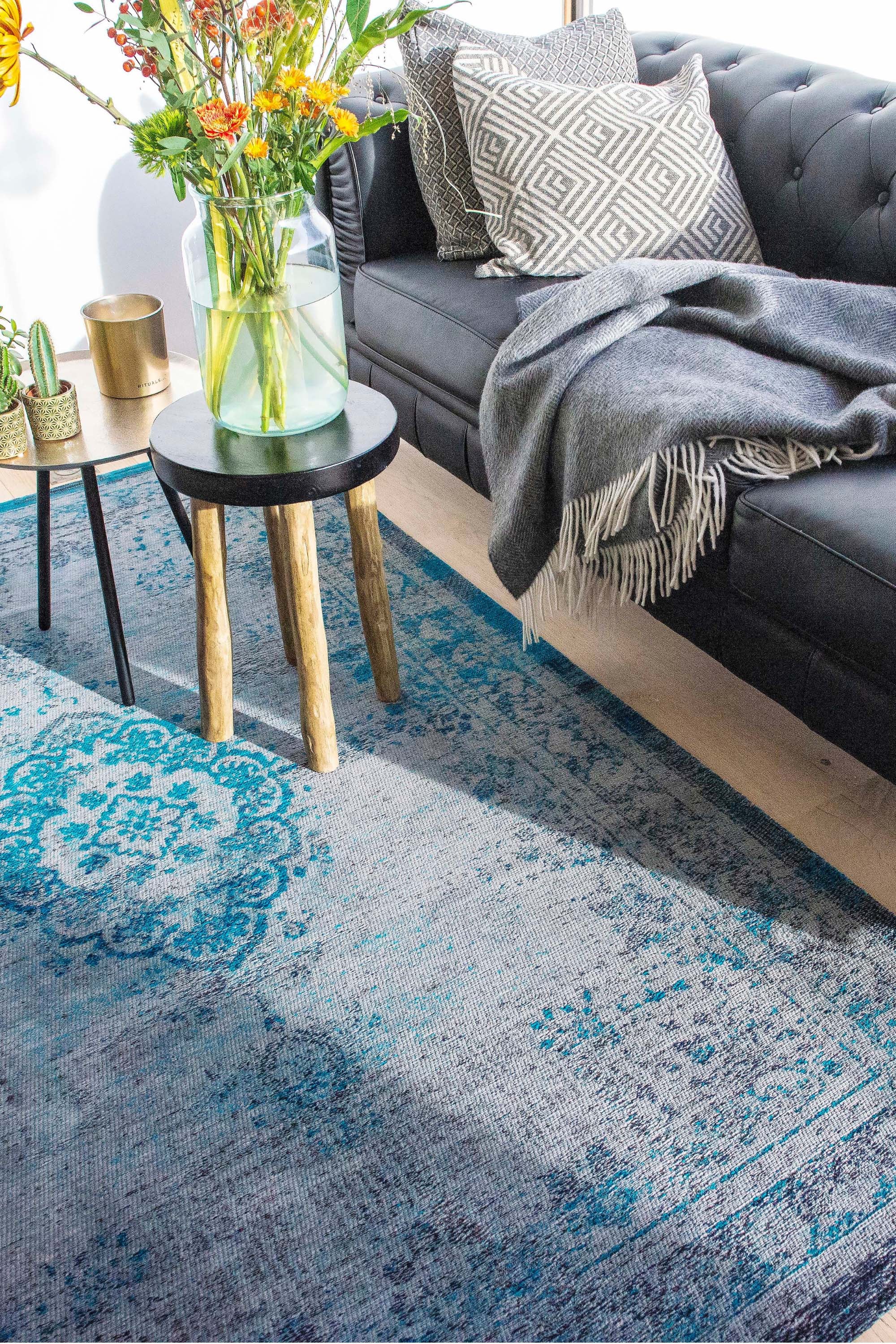 Grey and blue flatweave rug with faded persian design