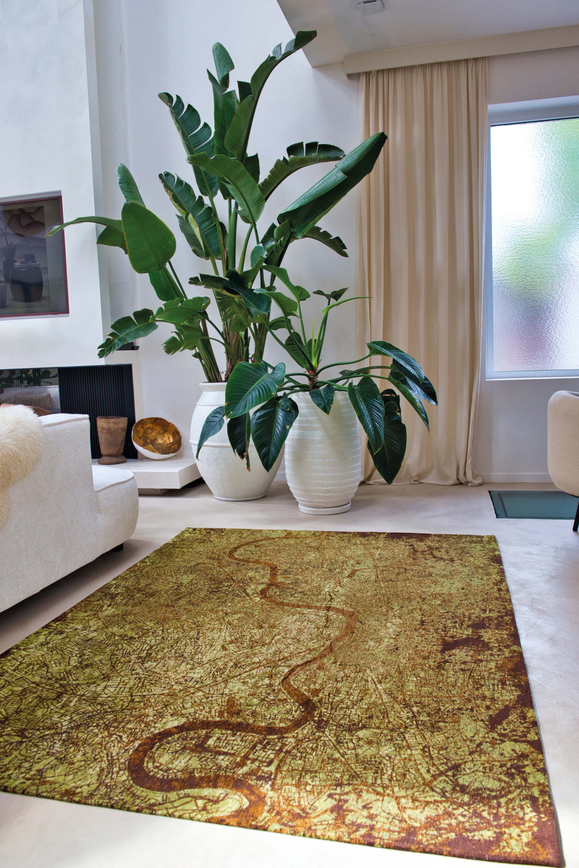 Green abstract rug with a pattern inspired by the map of London