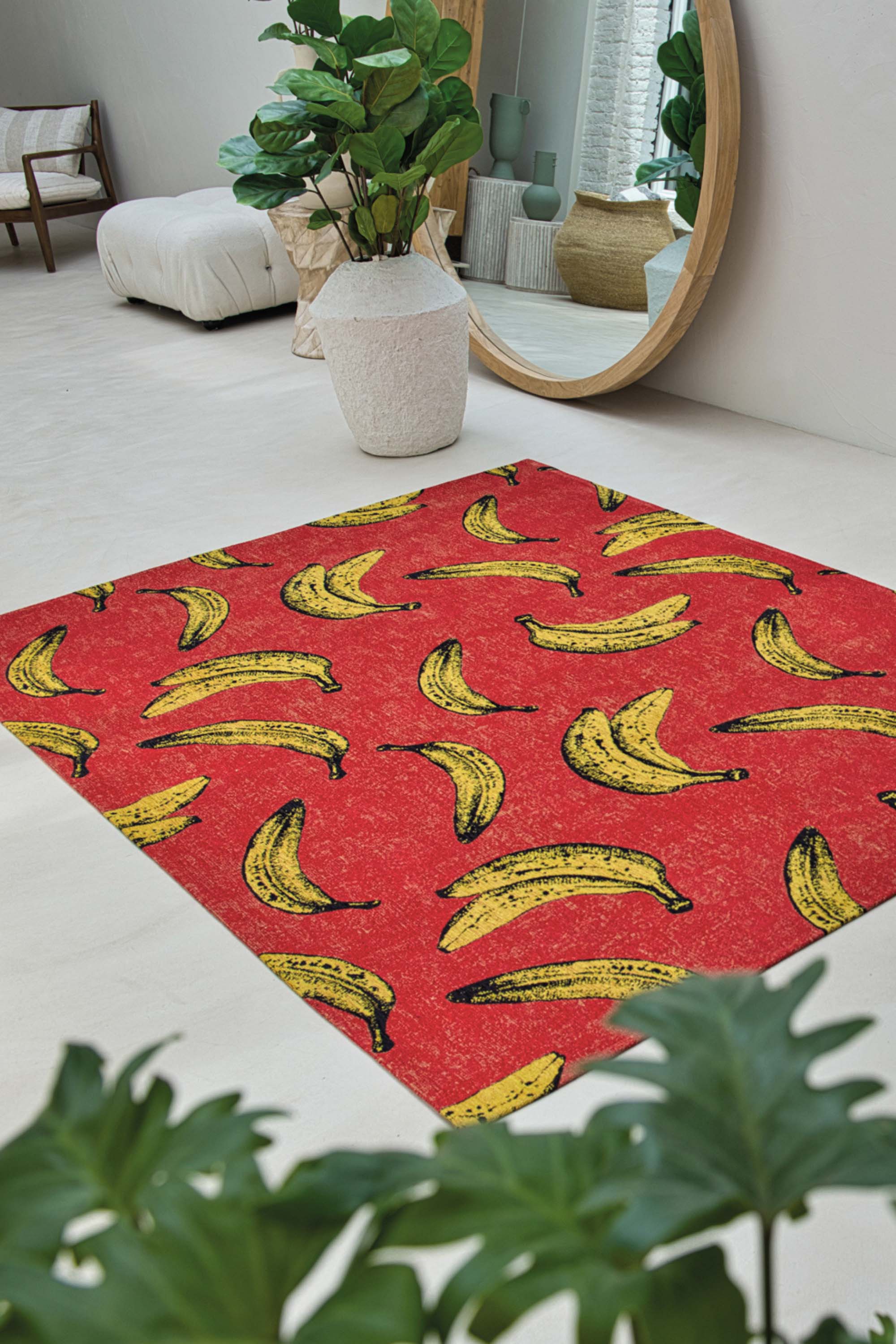 Modern red rug with repeated banana motif