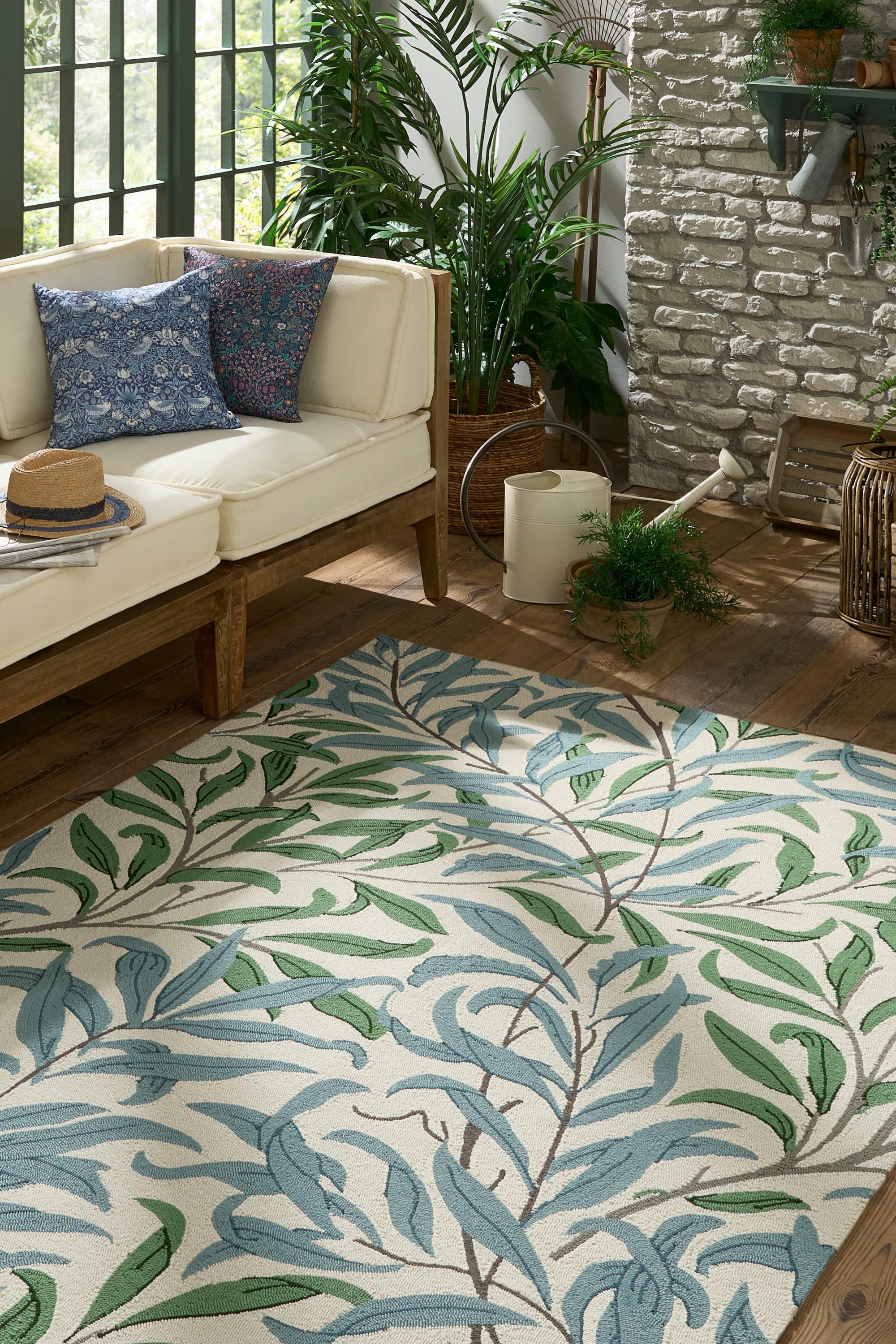 blue indoor/outdoor rug with floral pattern