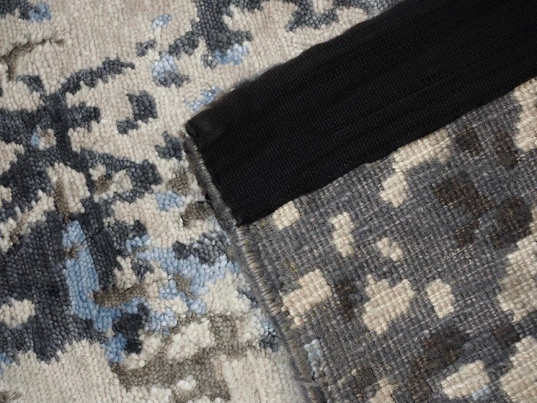 abstract area rug in grey, beige and blue