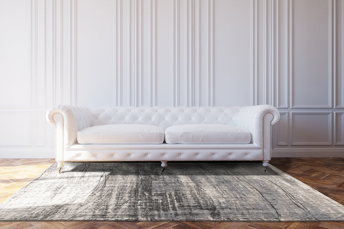 White flatweave rug with grey abstract pattern