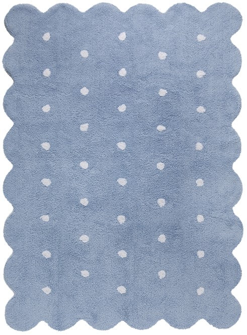 Rectangular blue cotton rug with scalloped border and white polka dot design