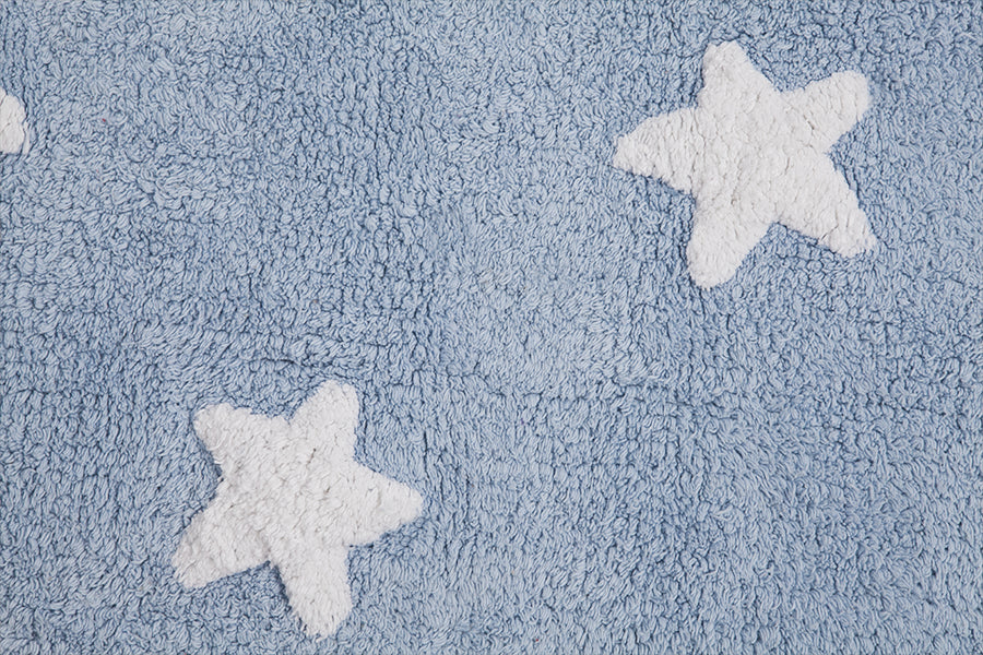 Rectangular blue cotton rug decorated with white stars