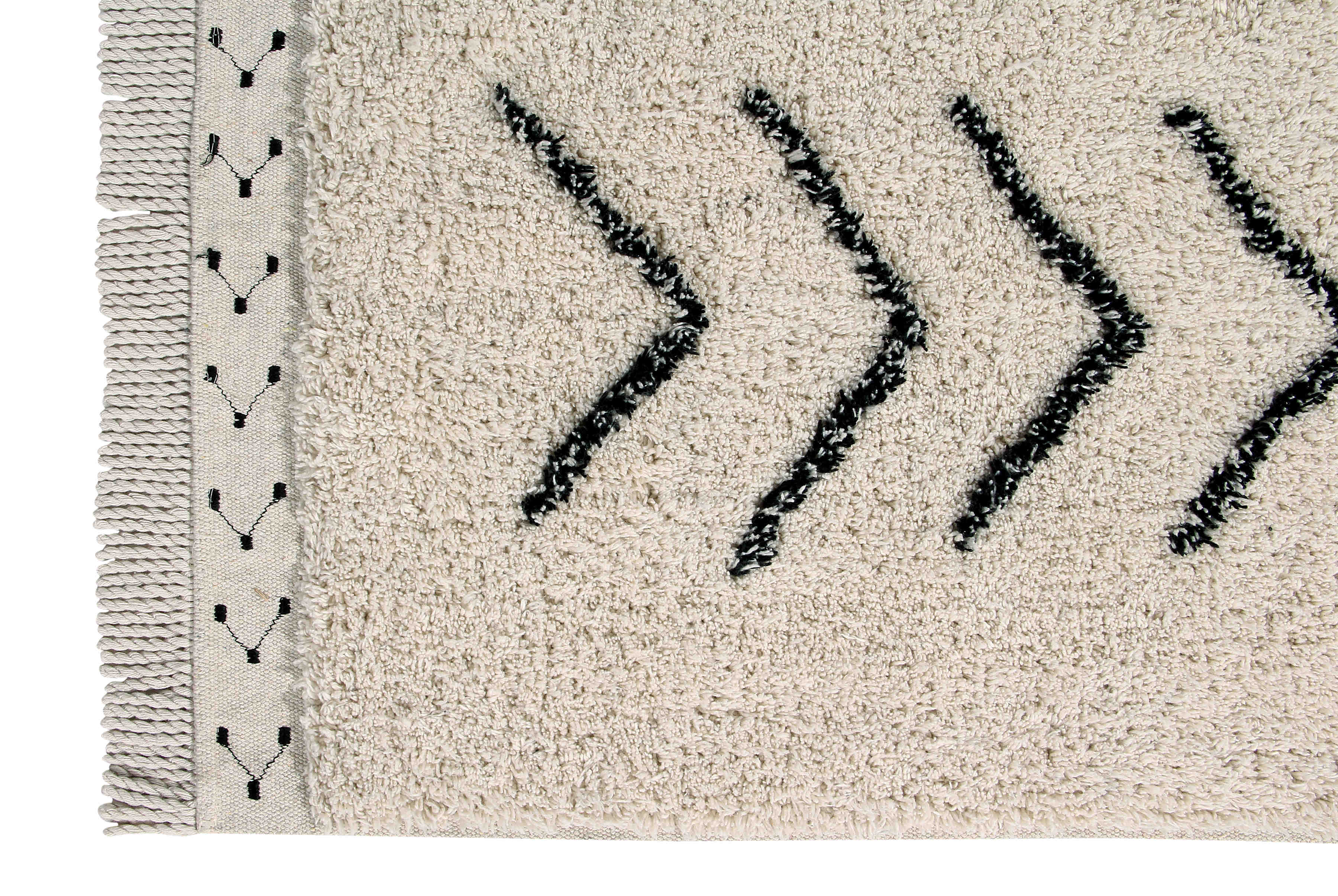 Rectangular beige cotton rug decorated with a black moroccan tribal designs