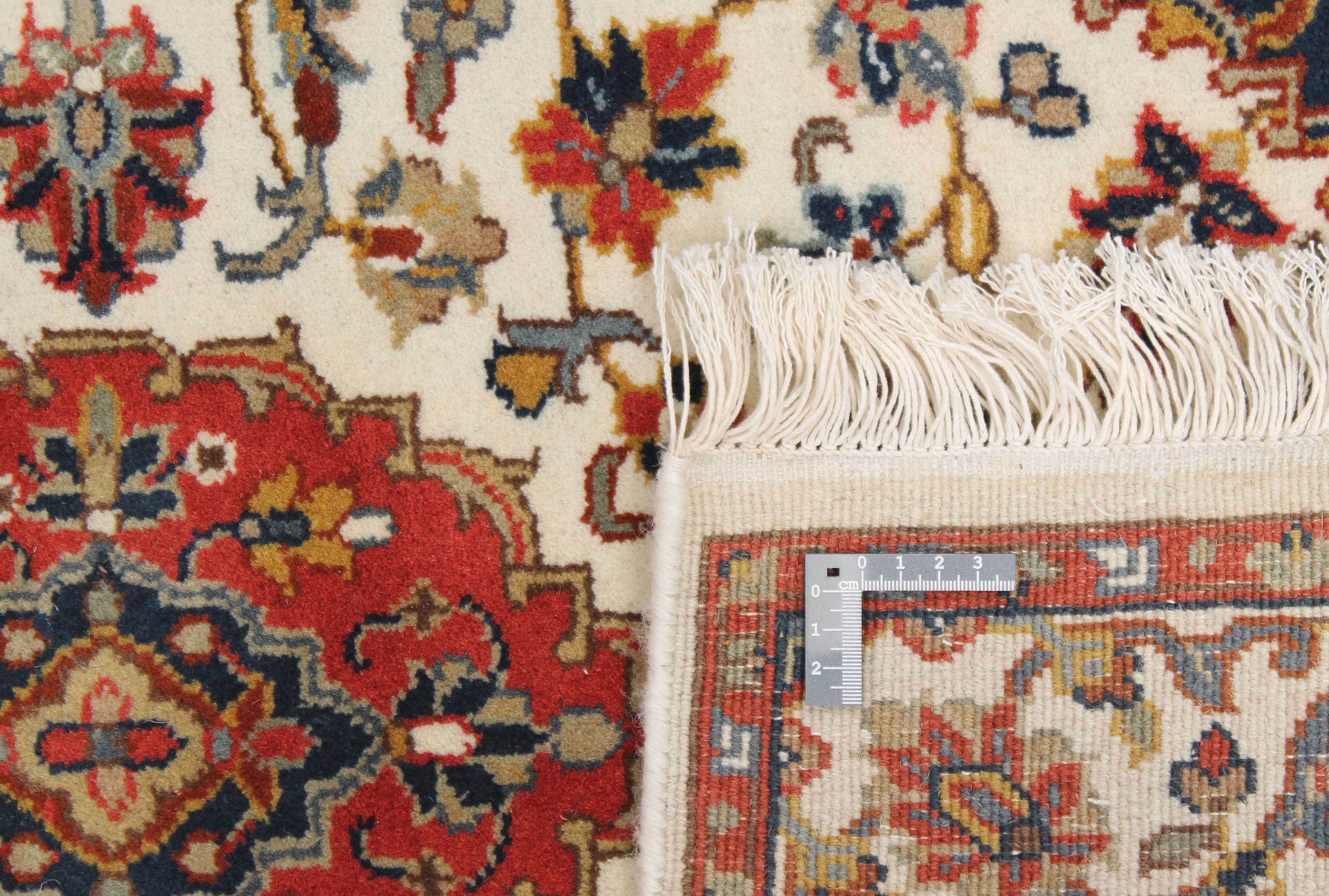 oriental runner with traditional floral design in beige