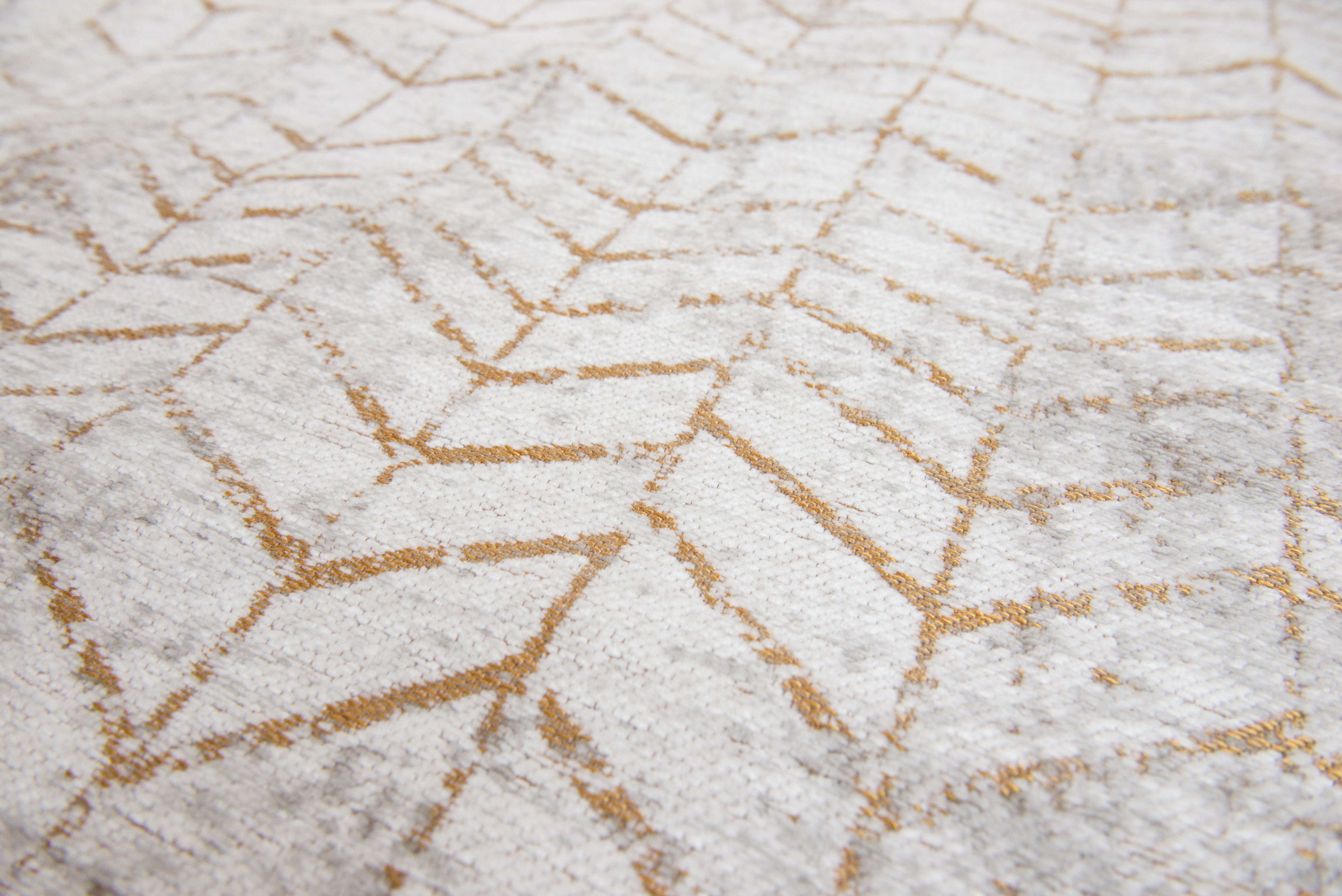 White flatweave runner rug with faded yellow chevron pattern
