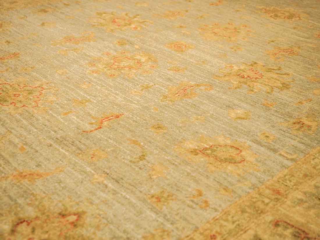 Authentic oriental rug with delicate floral pattern in beige