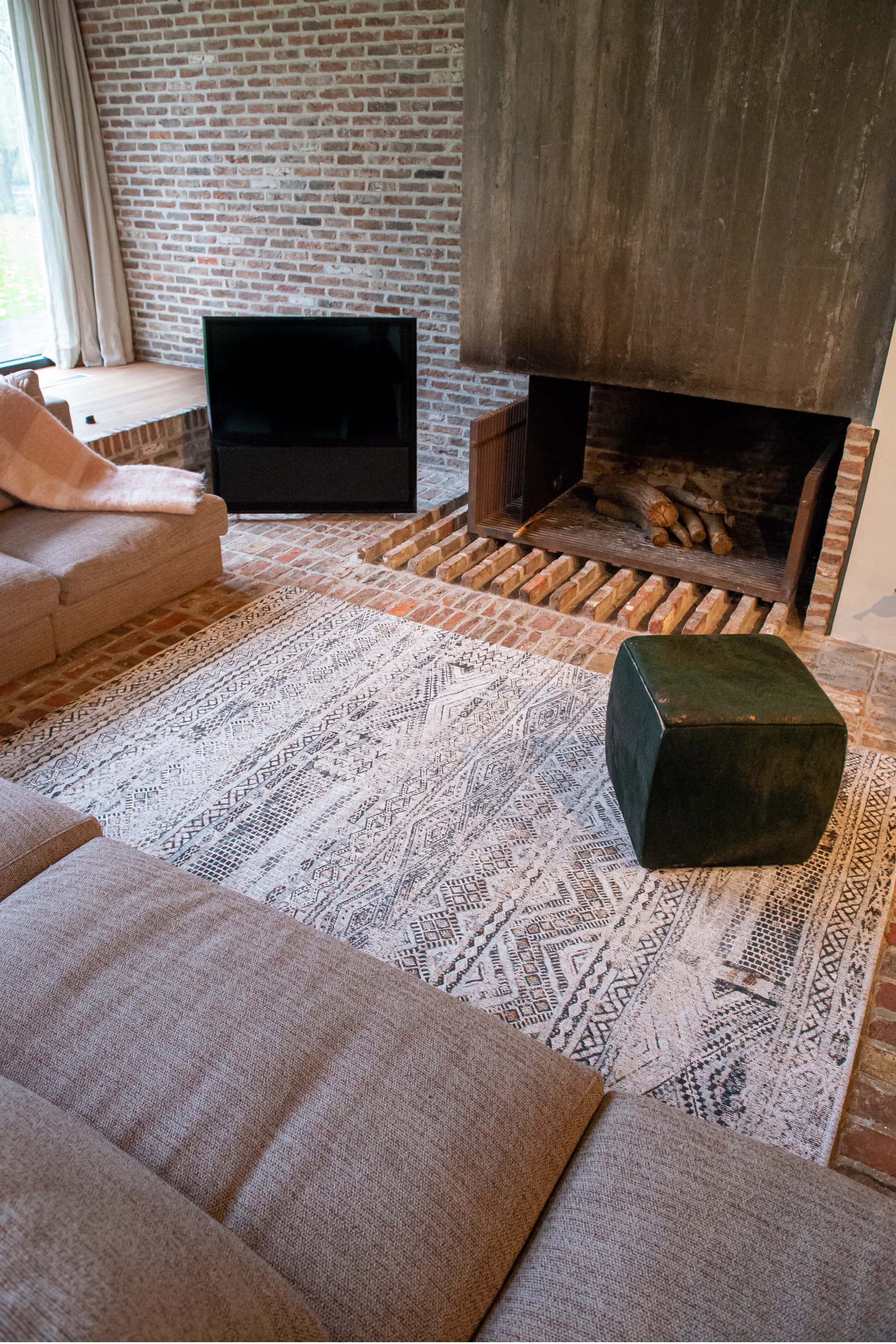 cream rug with a moroccan geometric pattern