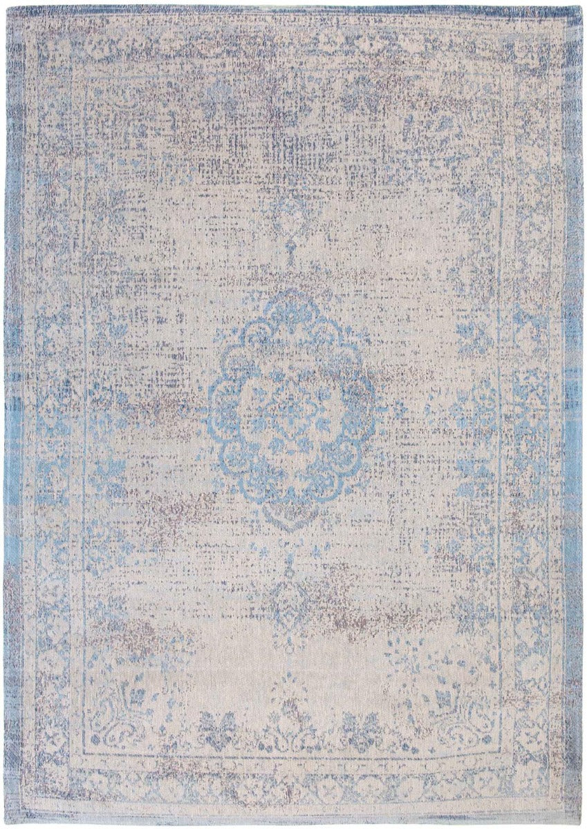 blue and grey flatweave rug with traditional medallion design

