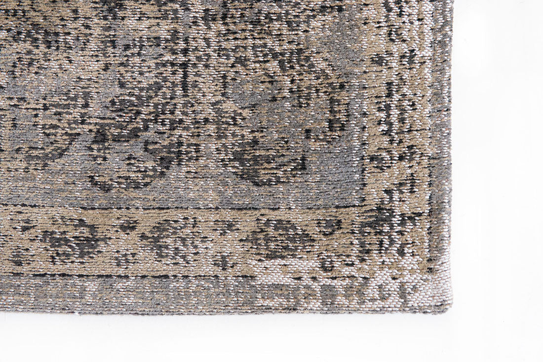 taupe brown vintage style rug with a traditional design