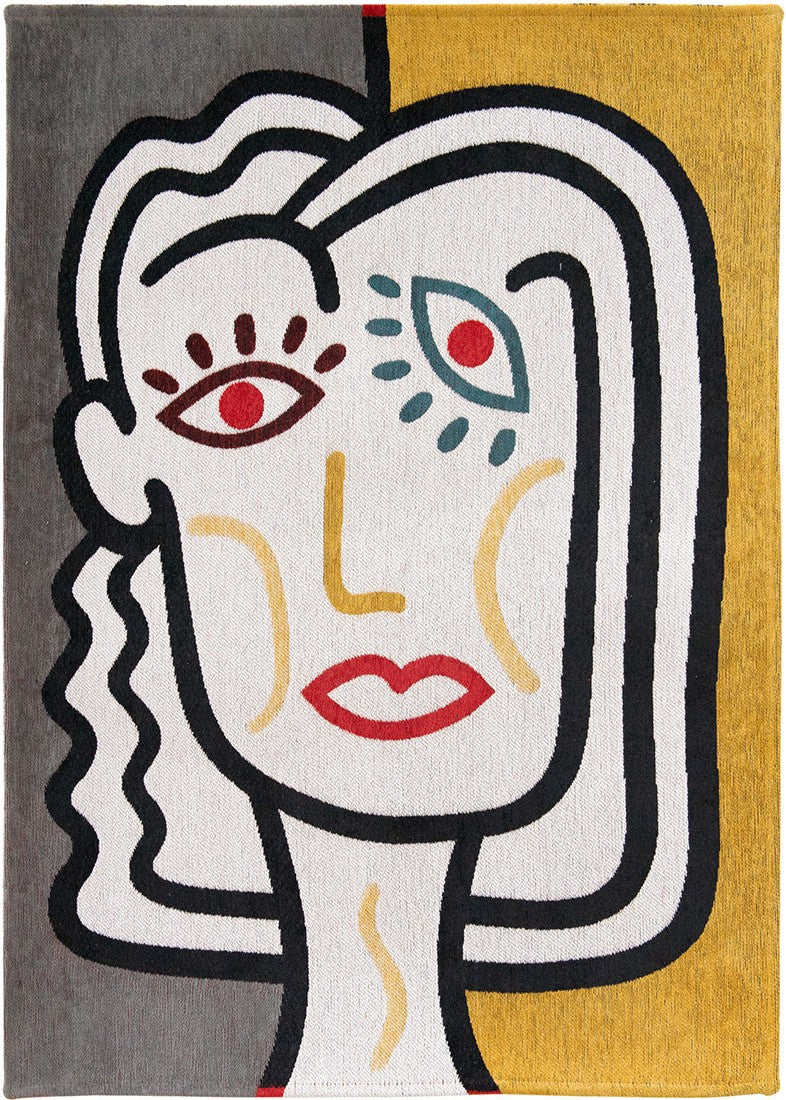 yellow, blue and red rug with an abstract face