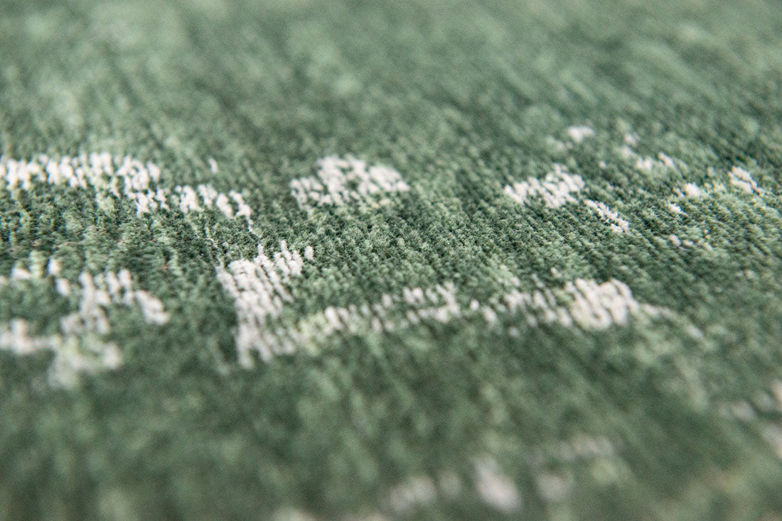 green vintage style rug