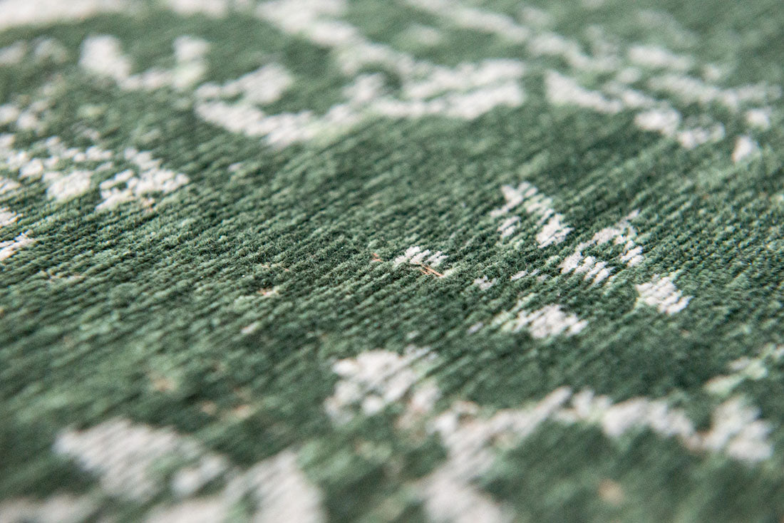 green vintage style rug