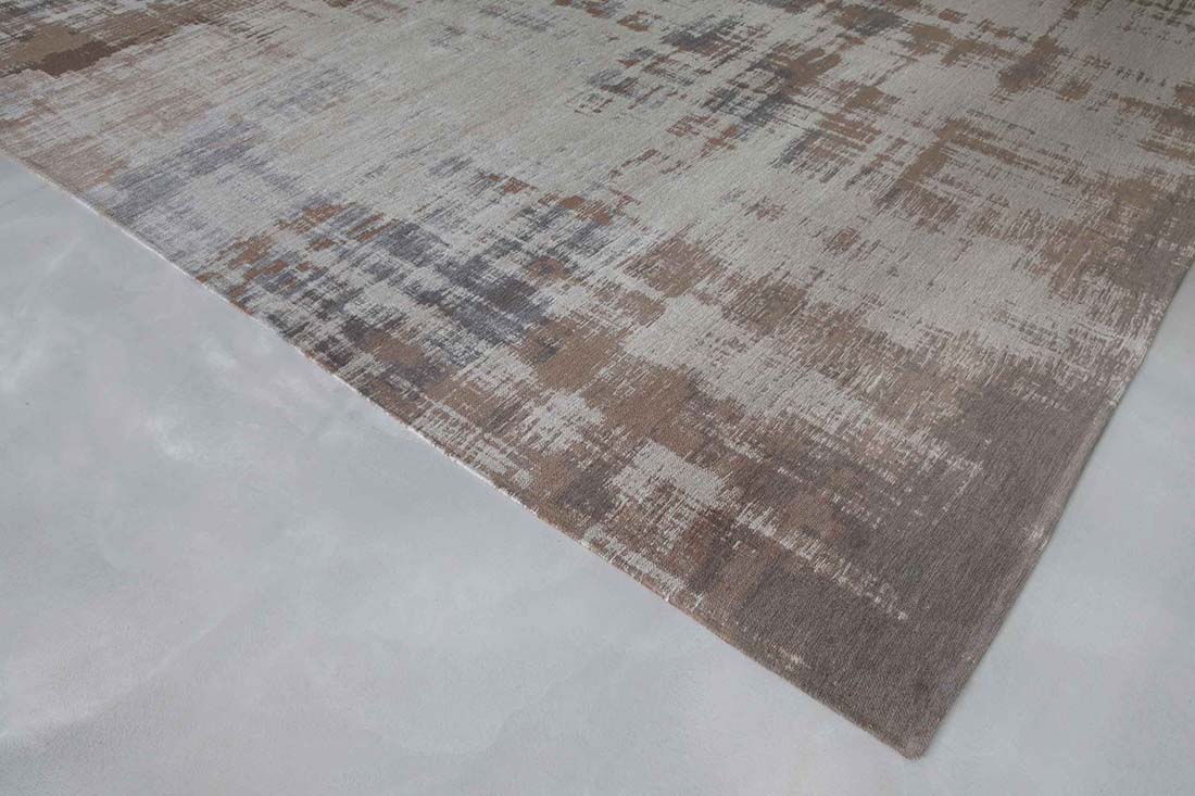 beige flatweave rug with modern abstract design

