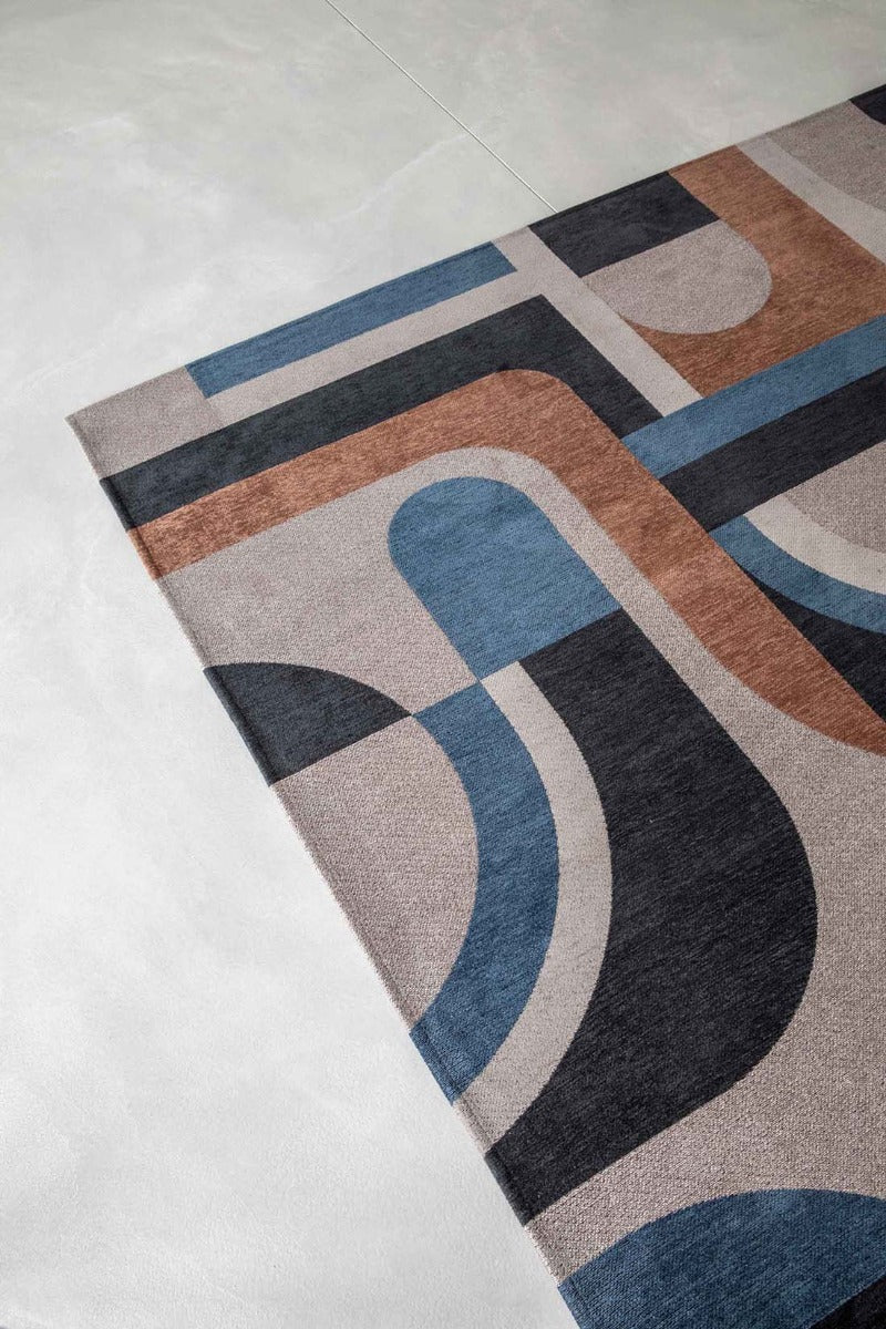 flatweave area rug with retro pattern in blue