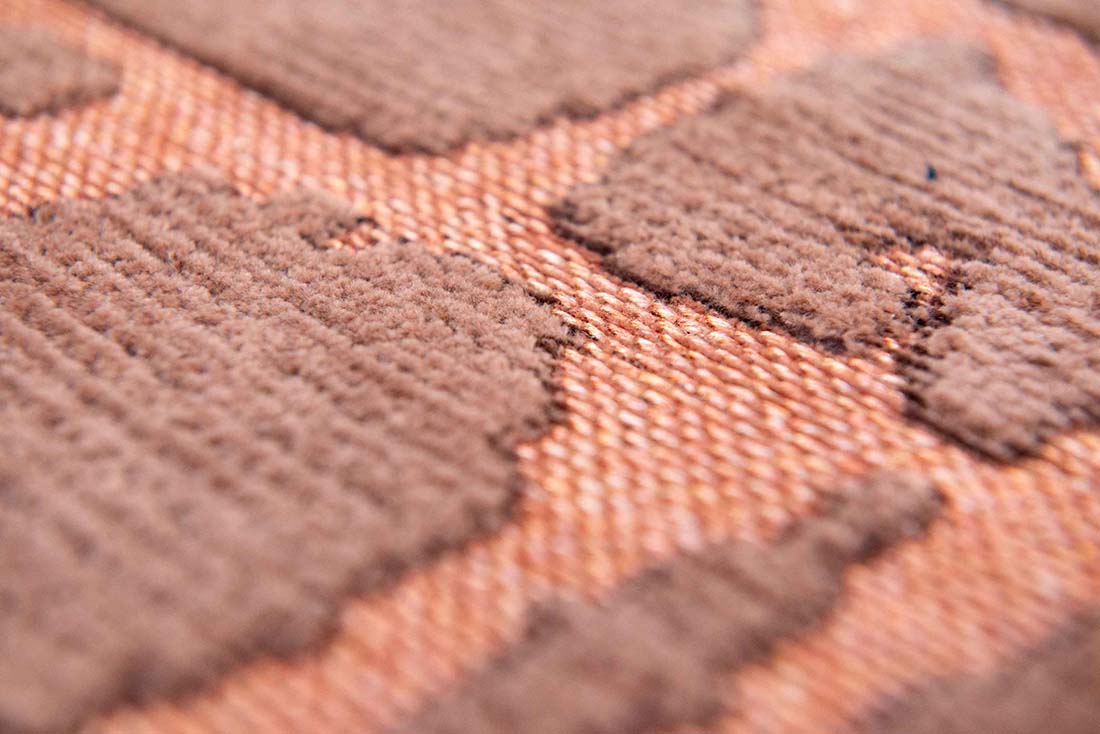 copper flatweave area rug with subtle