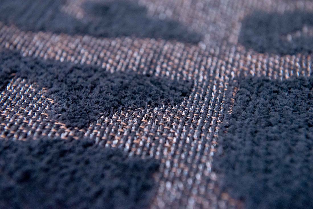 black flatweave area rug with subtle