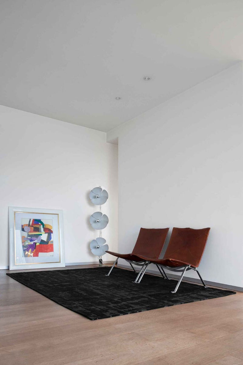 black flatweave area rug with subtle