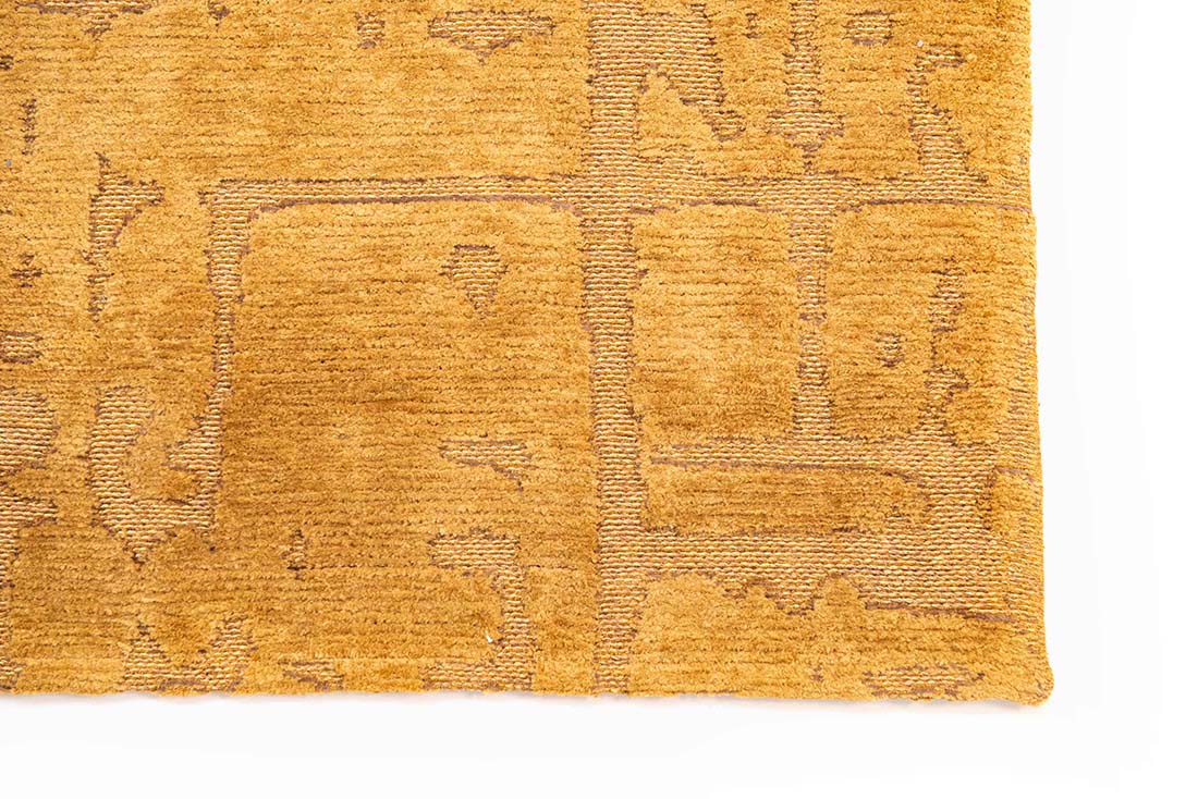 gold flatweave area rug with subtle