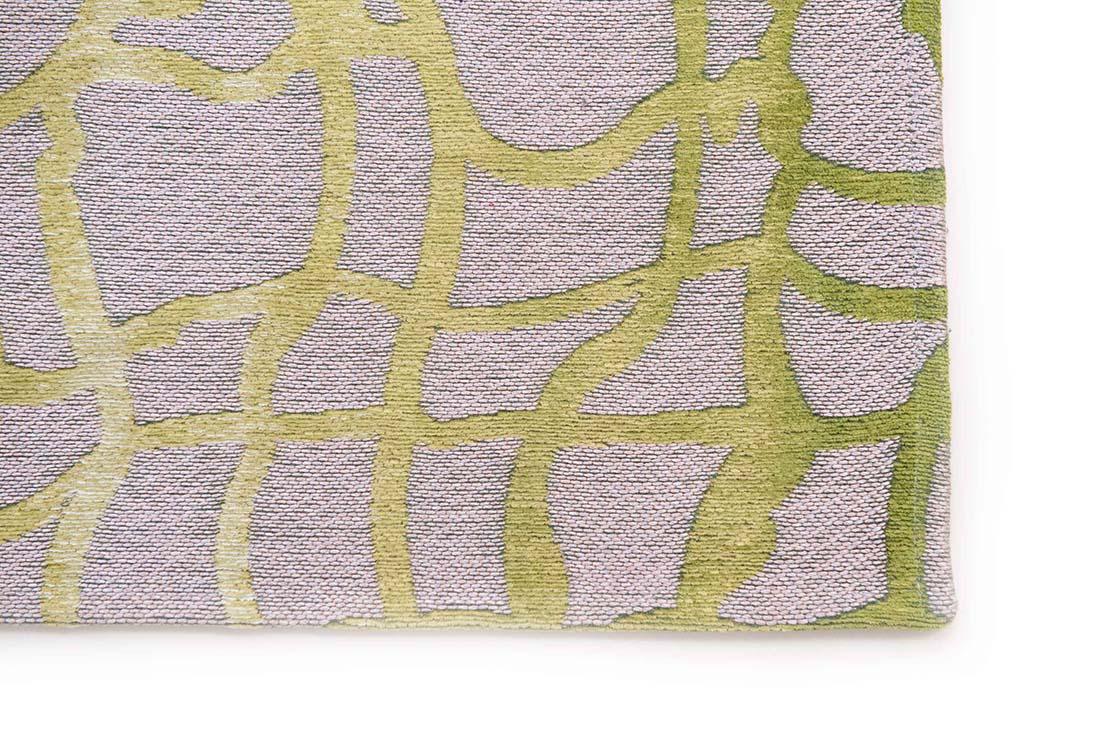 flatweave area rug with abstract green design
