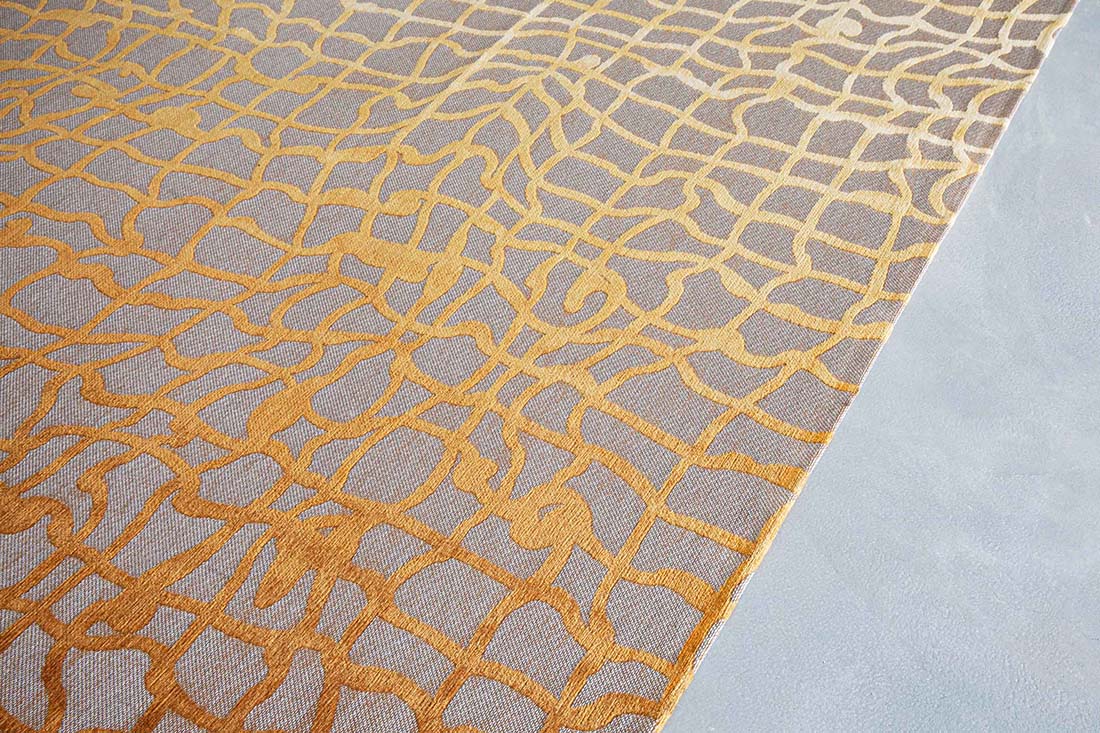 flatweave area rug with abstract yellow design
