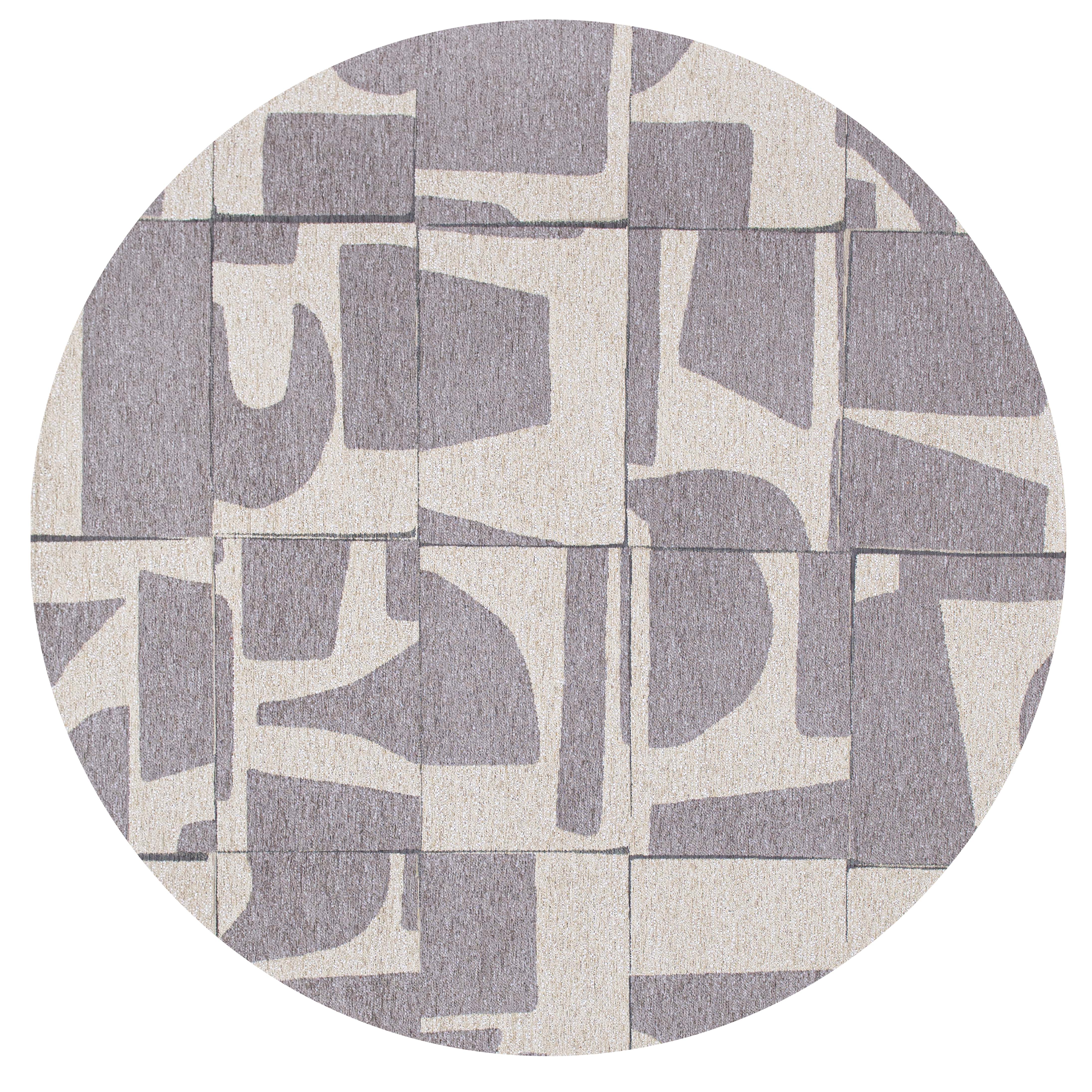 Modern abstract circle rug with grey patchwork pattern