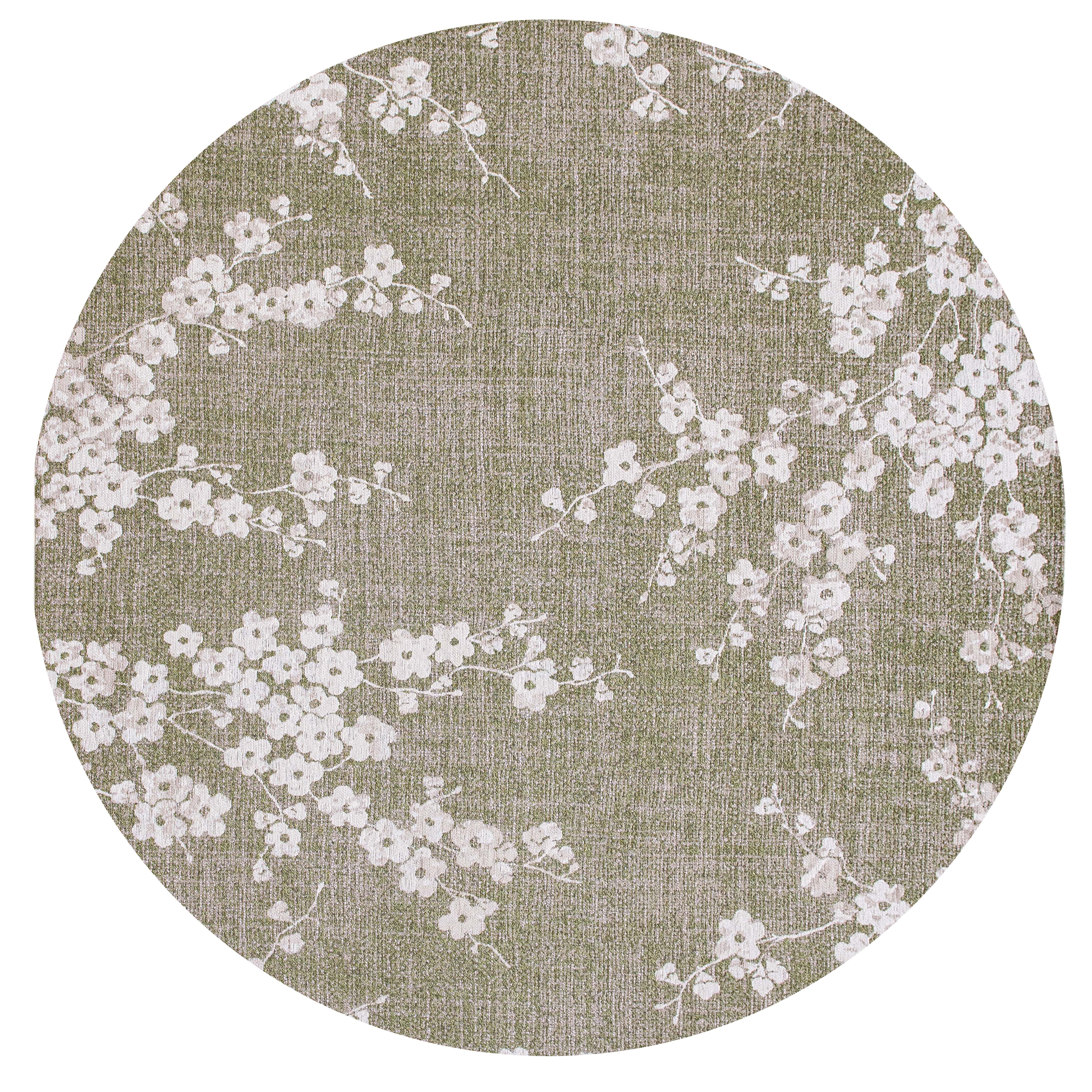 Modern abstract circle rug with subtle green floral pattern