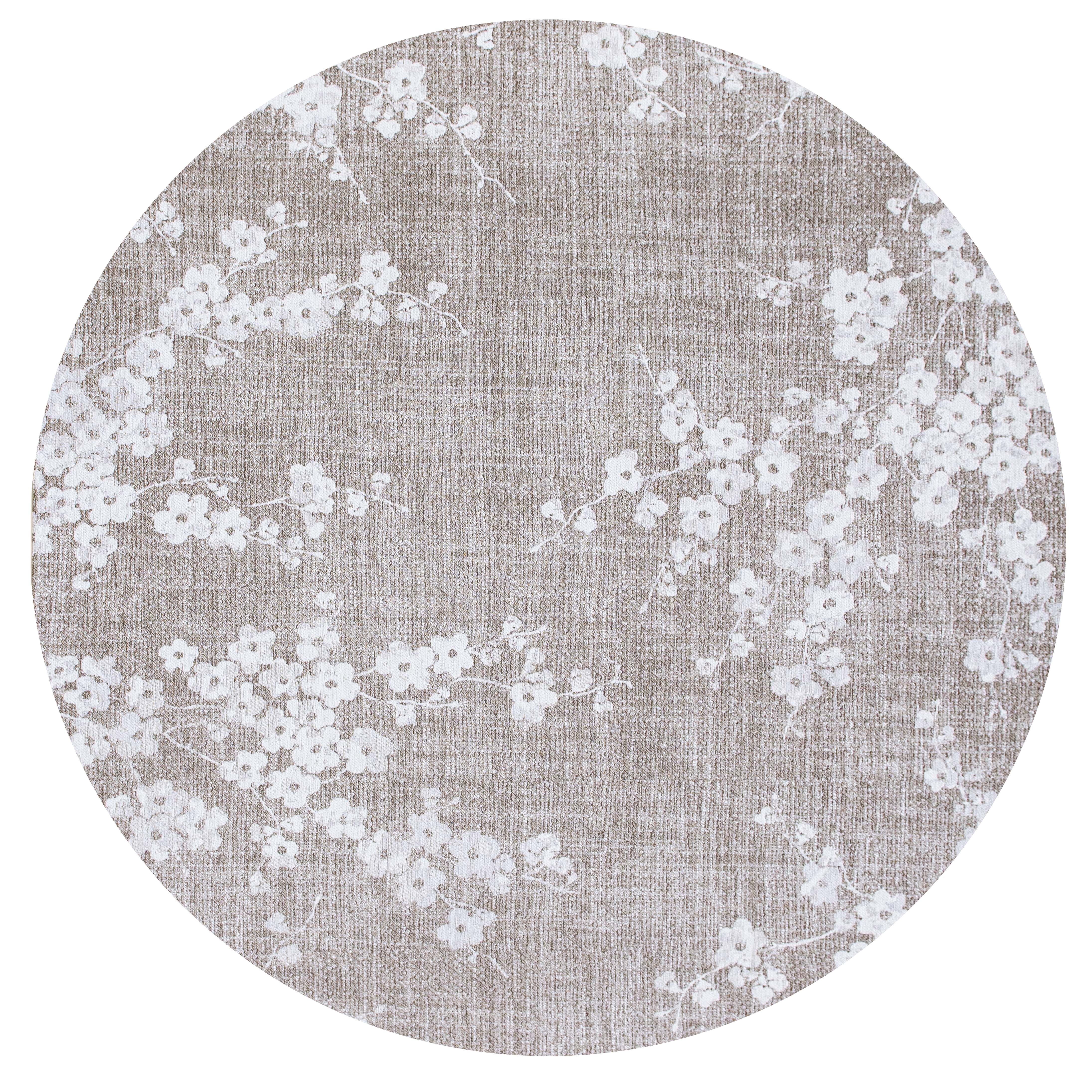 Modern abstract circle rug with subtle beige floral pattern