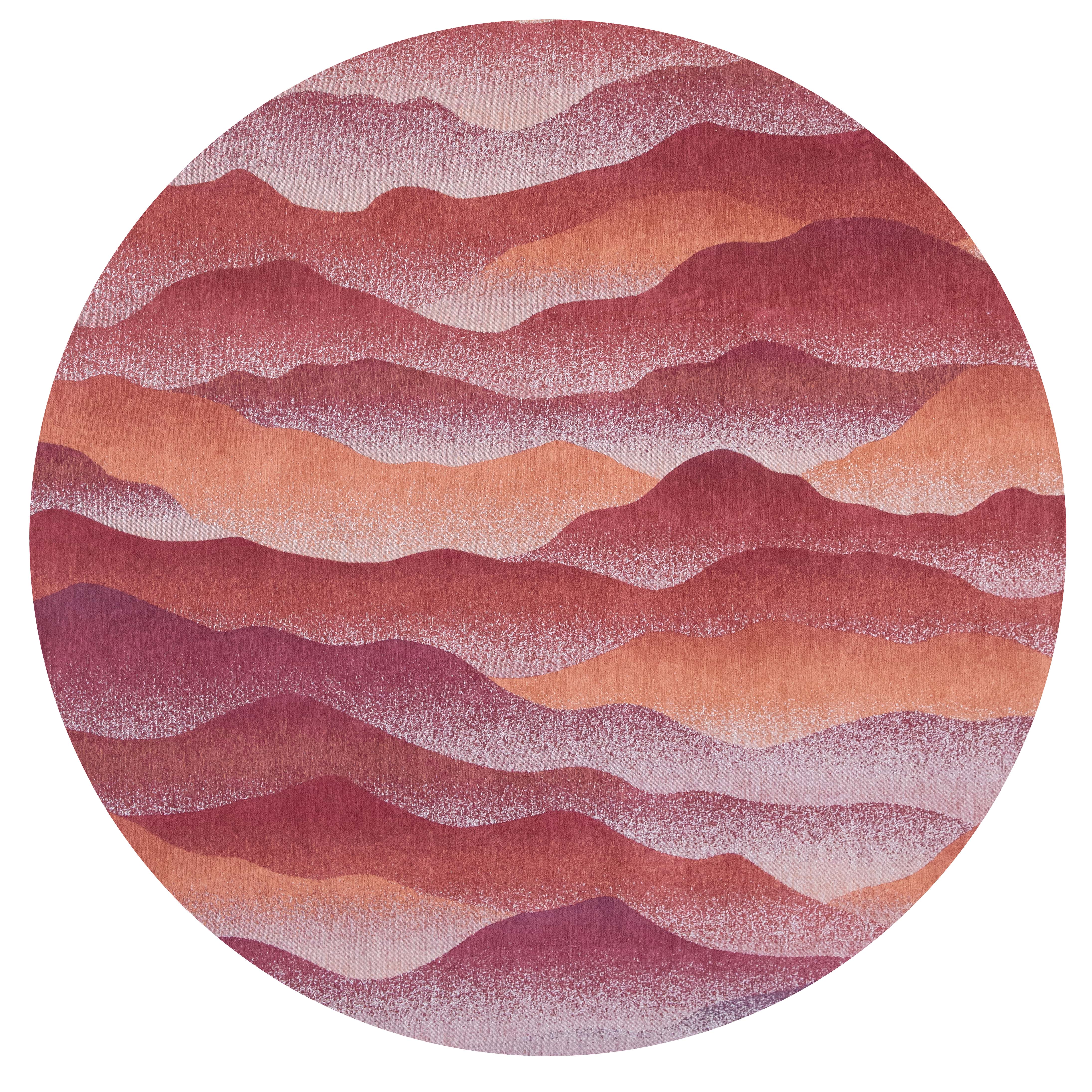 Modern circle rug with red abstract mountain range pattern