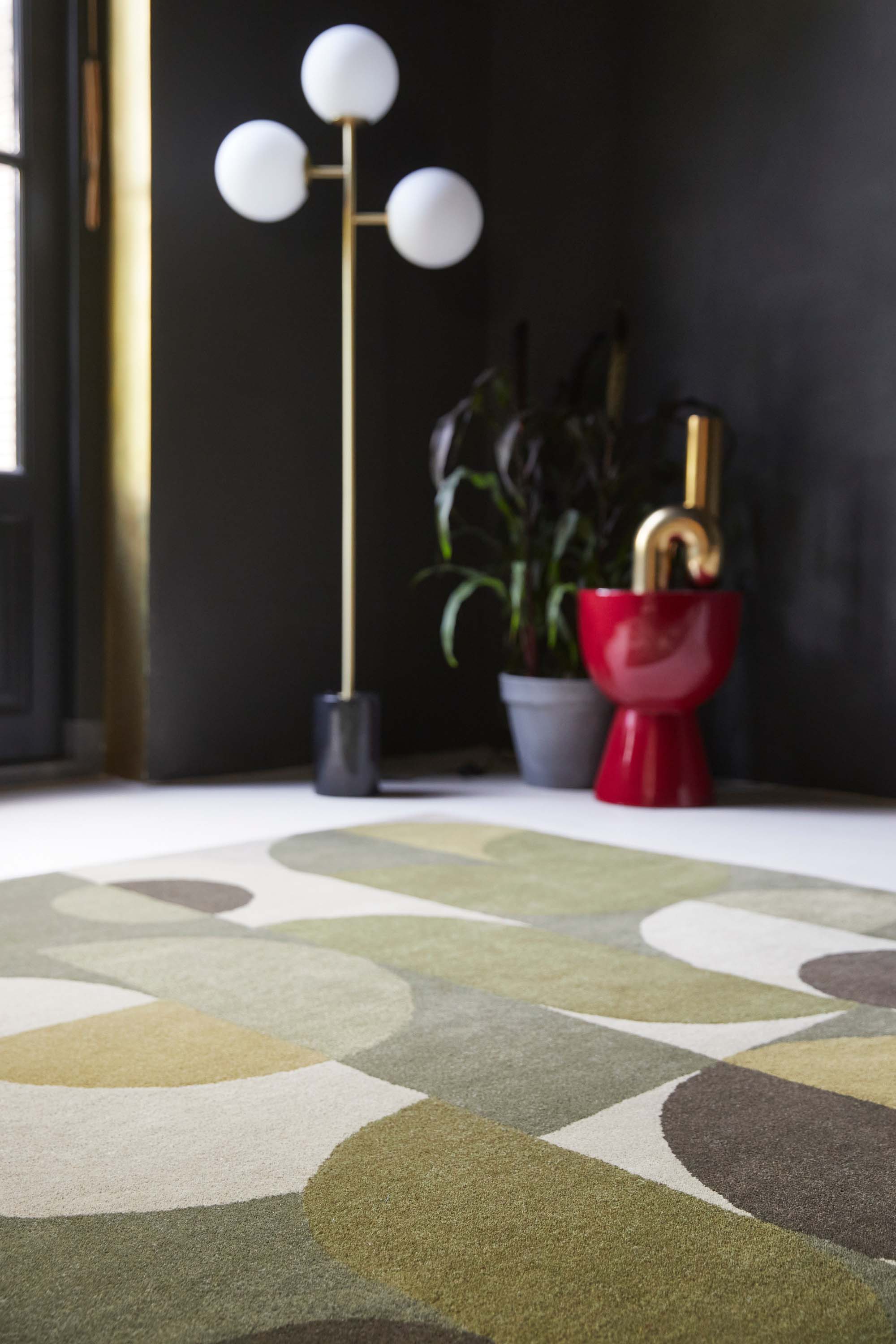 green wool area rug with retro design