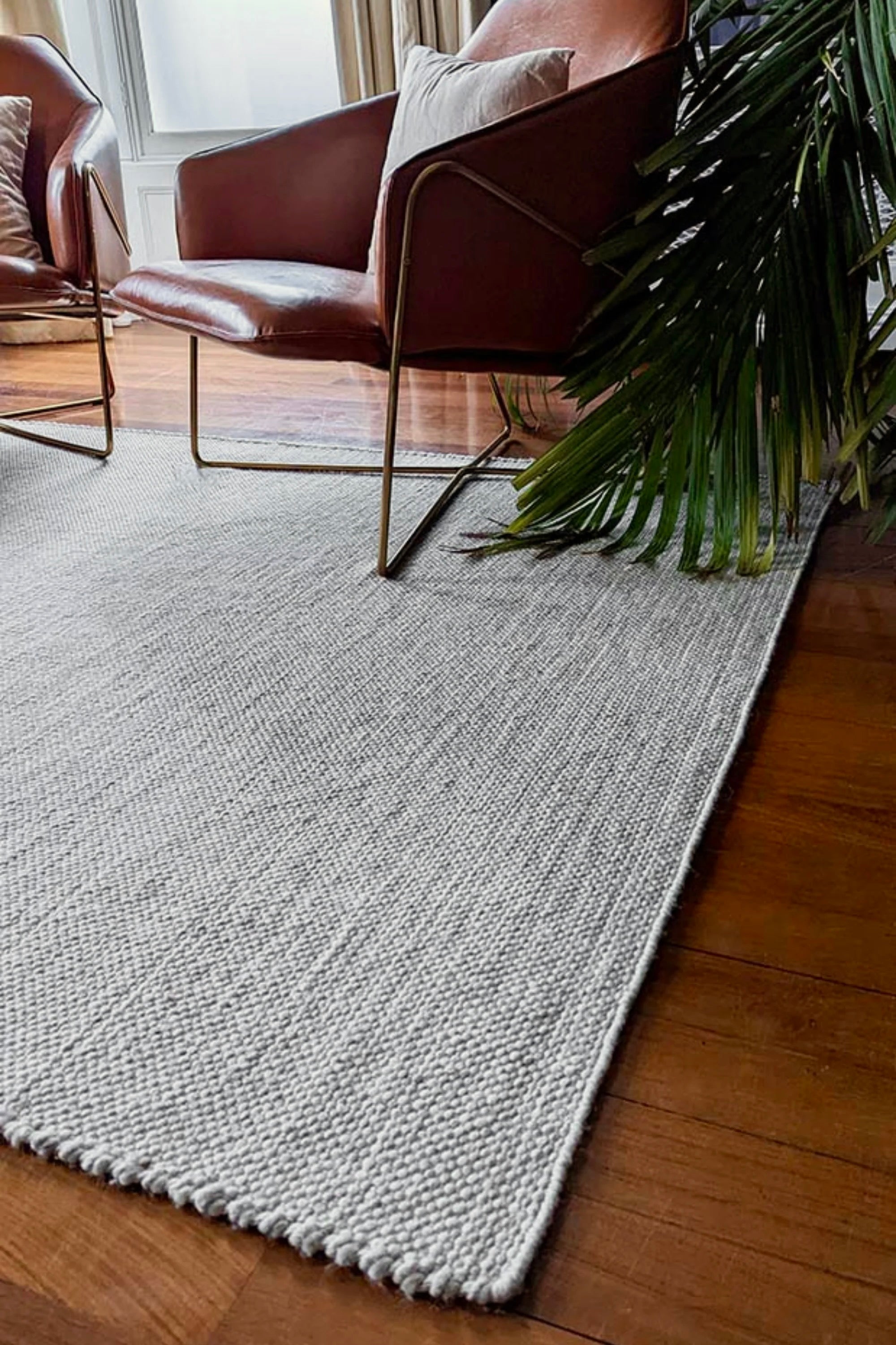 Simple beige textured area rug