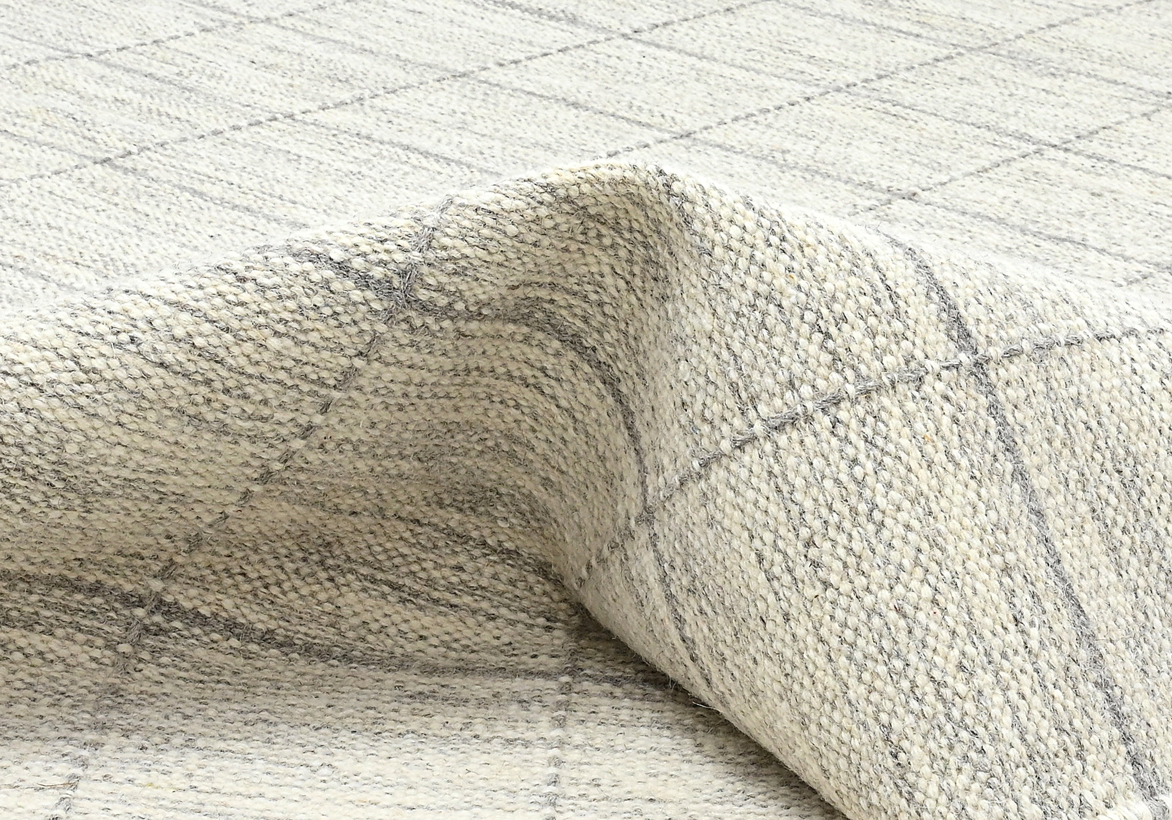 Beige neutral area rug with checkered design