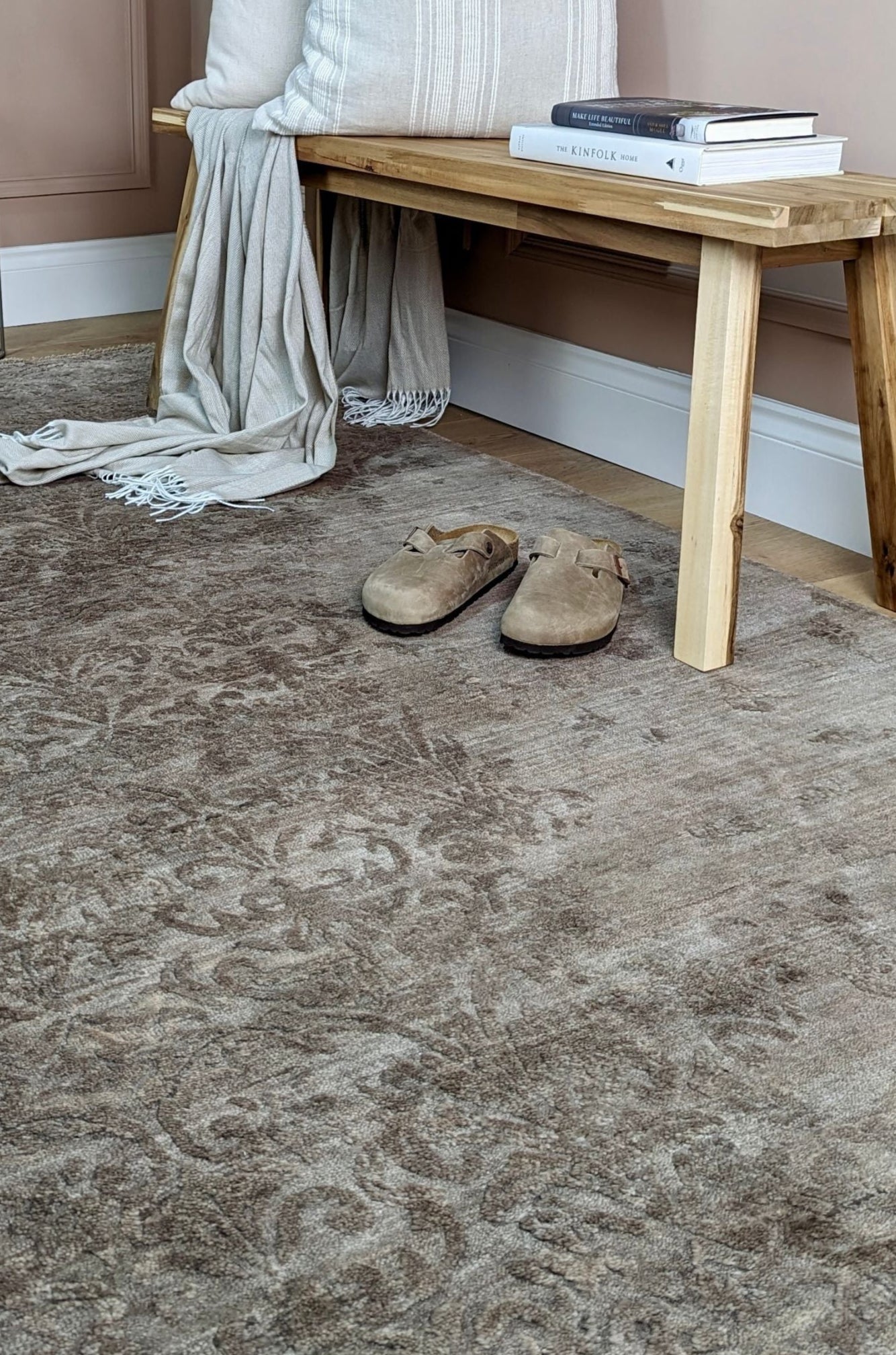 Authentic oriental rug with a damask pattern in beige