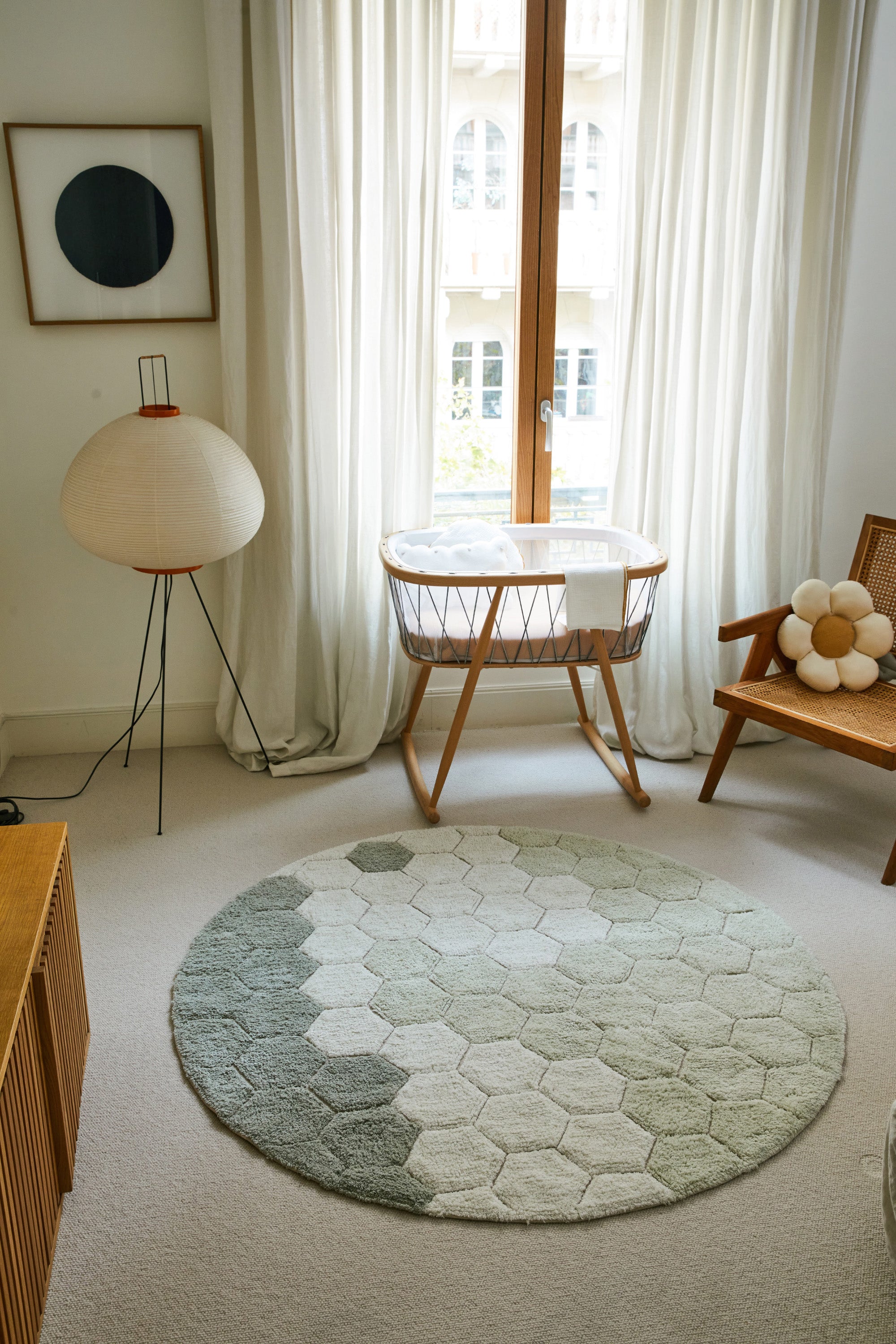 Round blue and sage rug with honeycomb pattern