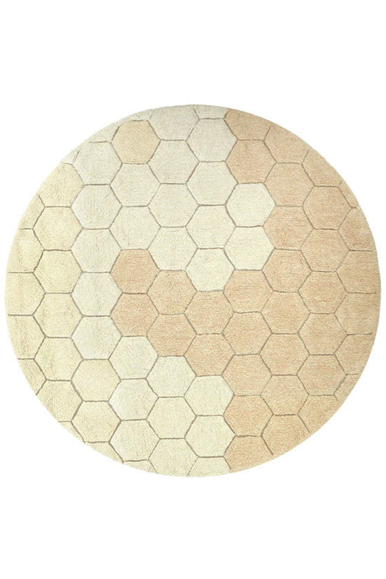Round gold rug with honeycomb pattern