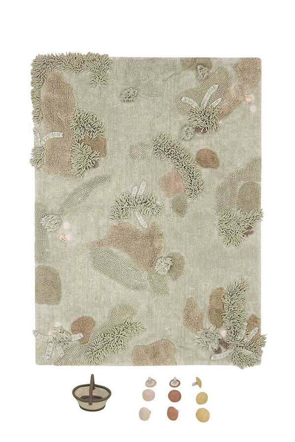 Green forest inspired rug with added mushroom toys
