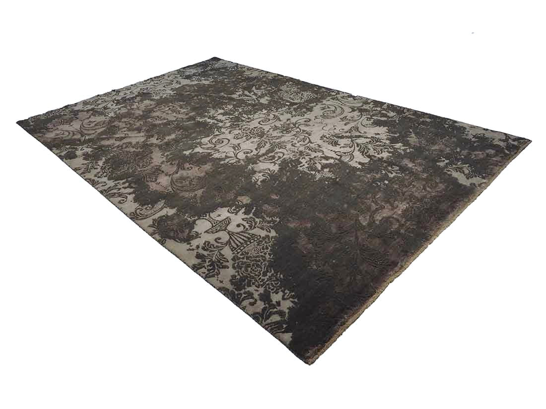 Authentic oriental rug with a damask pattern in beige and brown